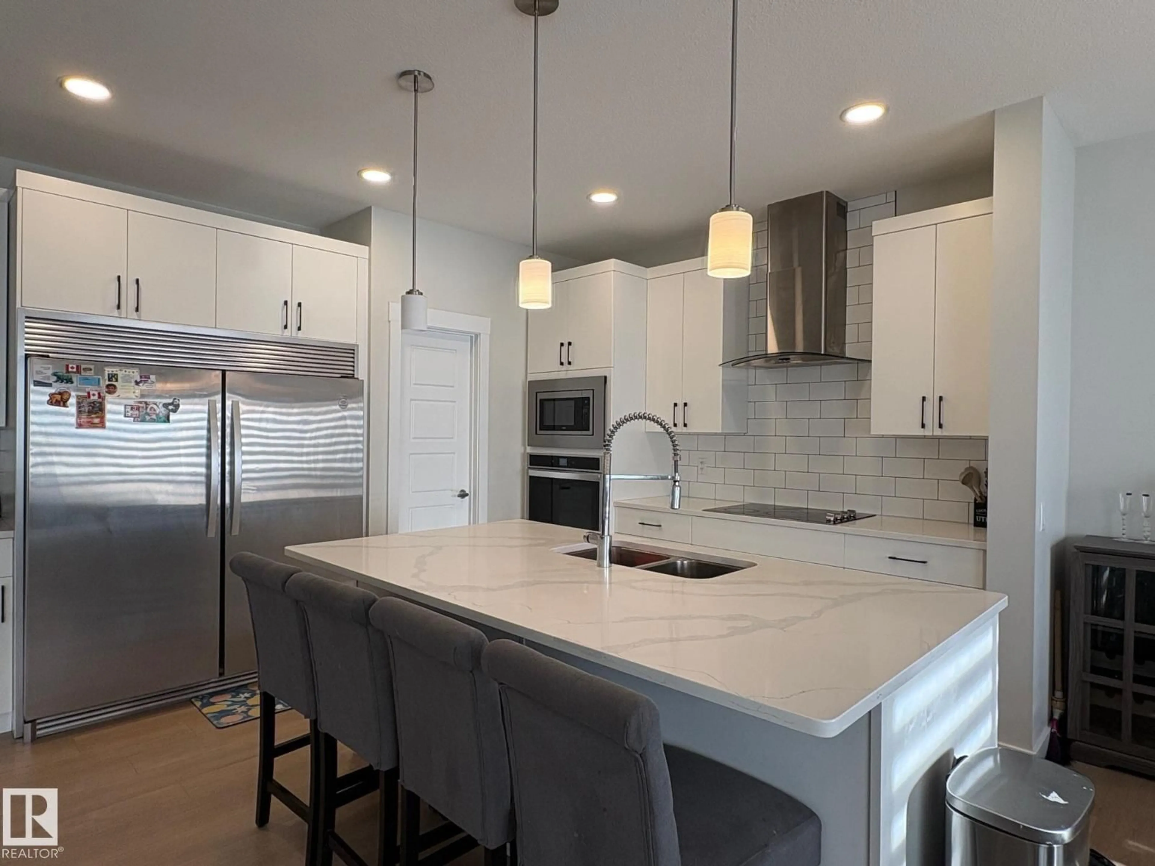 Open concept kitchen, ceramic/tile floor for 9952 227 ST, Edmonton Alberta T5T7V1