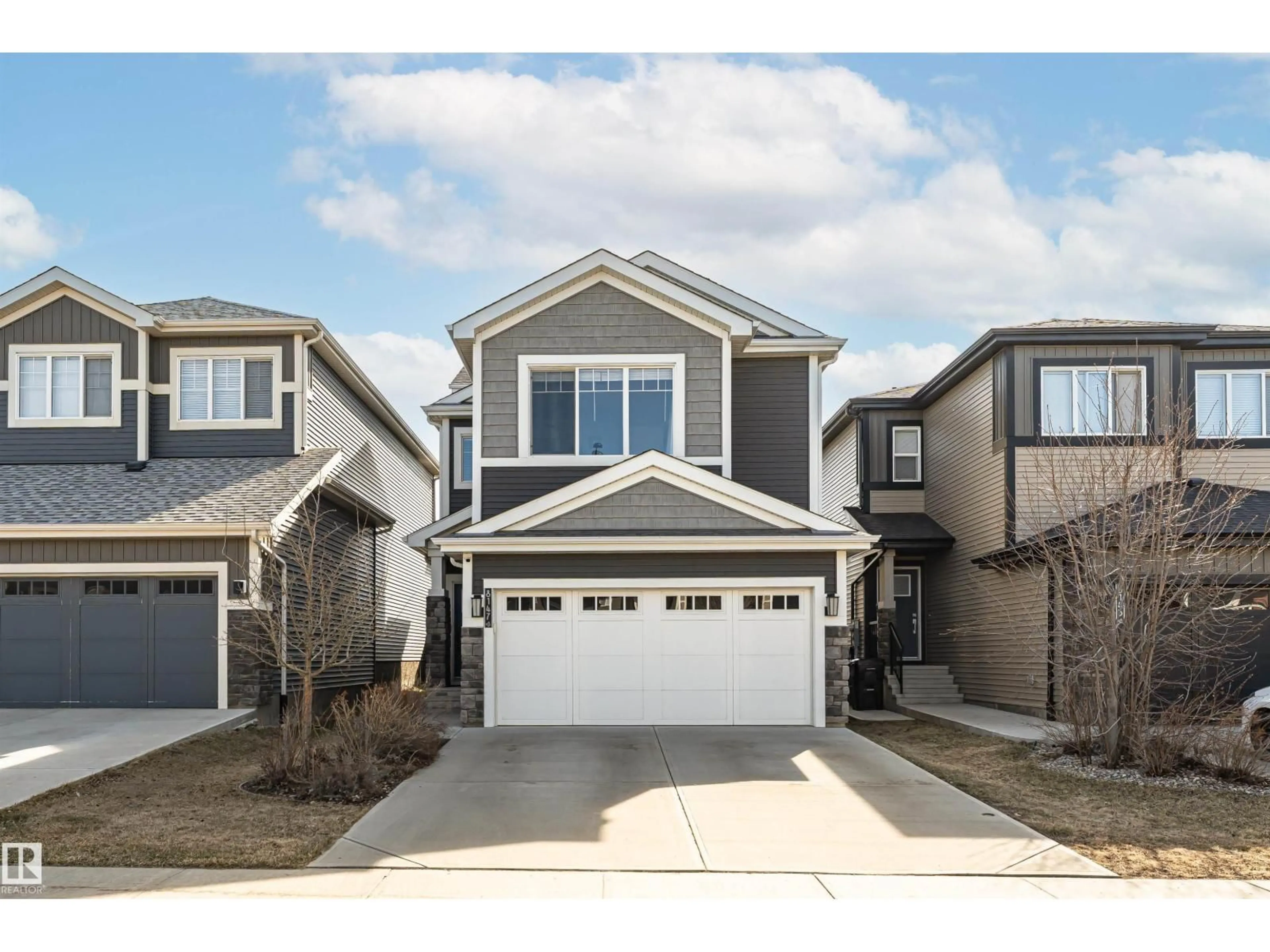 Home with vinyl exterior material, street for NW - 8147 226 ST, Edmonton Alberta T5T7K9