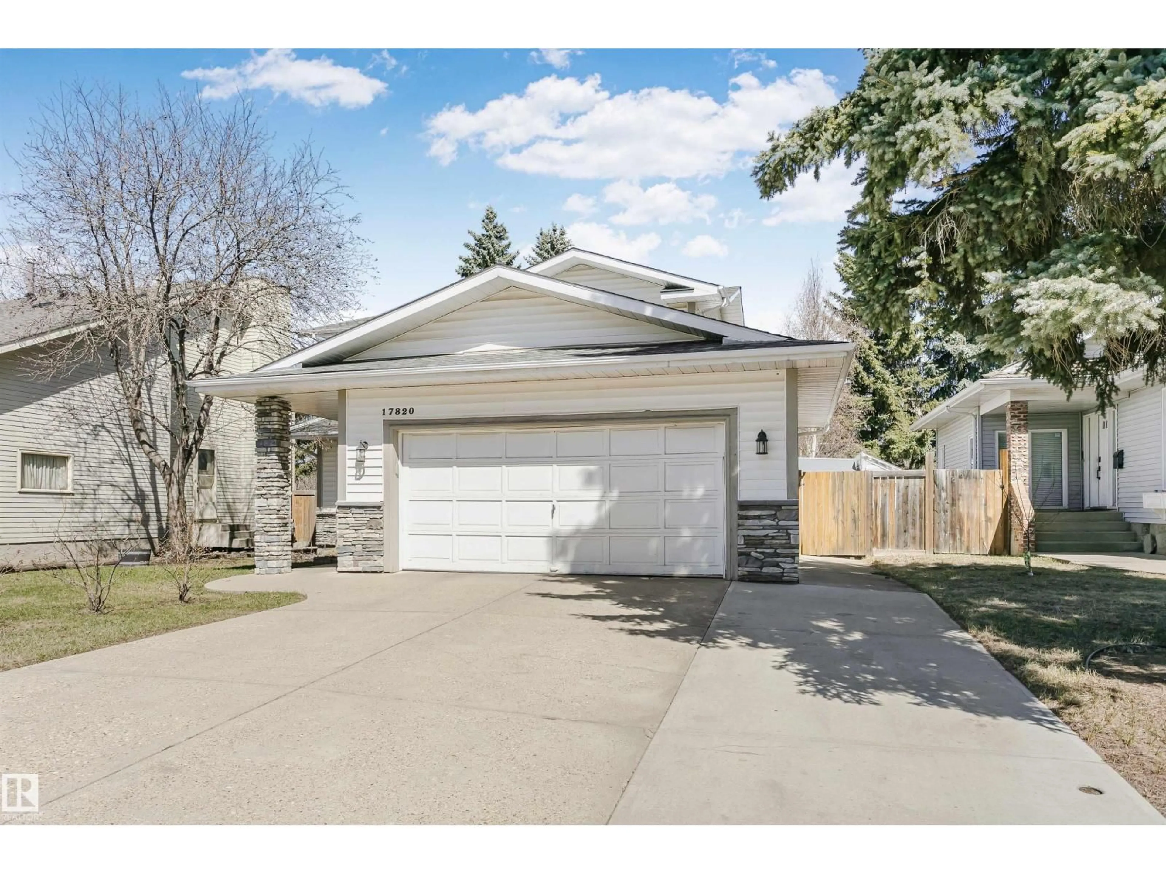 Home with vinyl exterior material, street for 17820 57 AV, Edmonton Alberta T6M1S5
