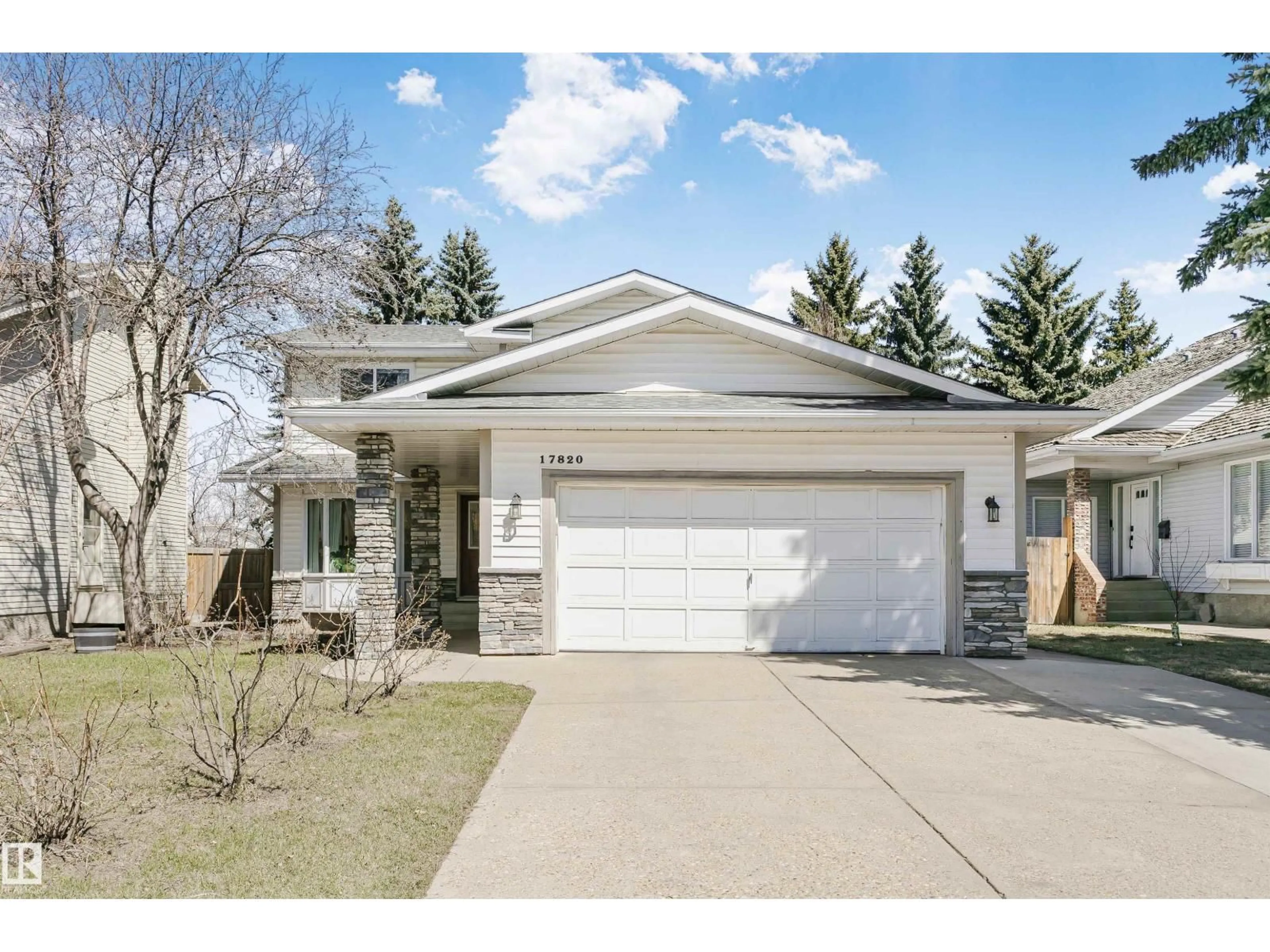 Home with vinyl exterior material, street for 17820 57 AV, Edmonton Alberta T6M1S5
