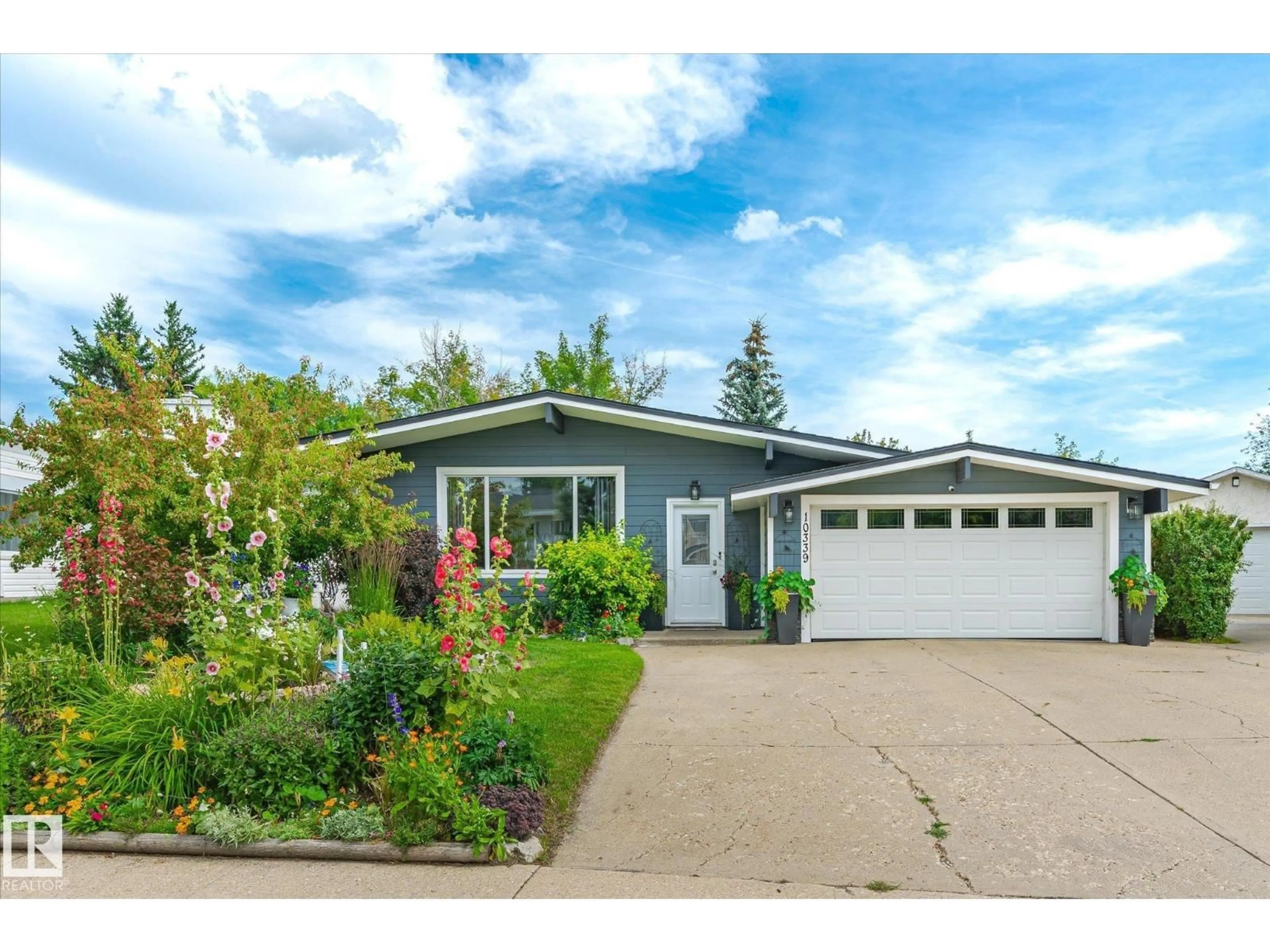 Home with vinyl exterior material, street for 10339 36A AV, Edmonton Alberta T6J2H5