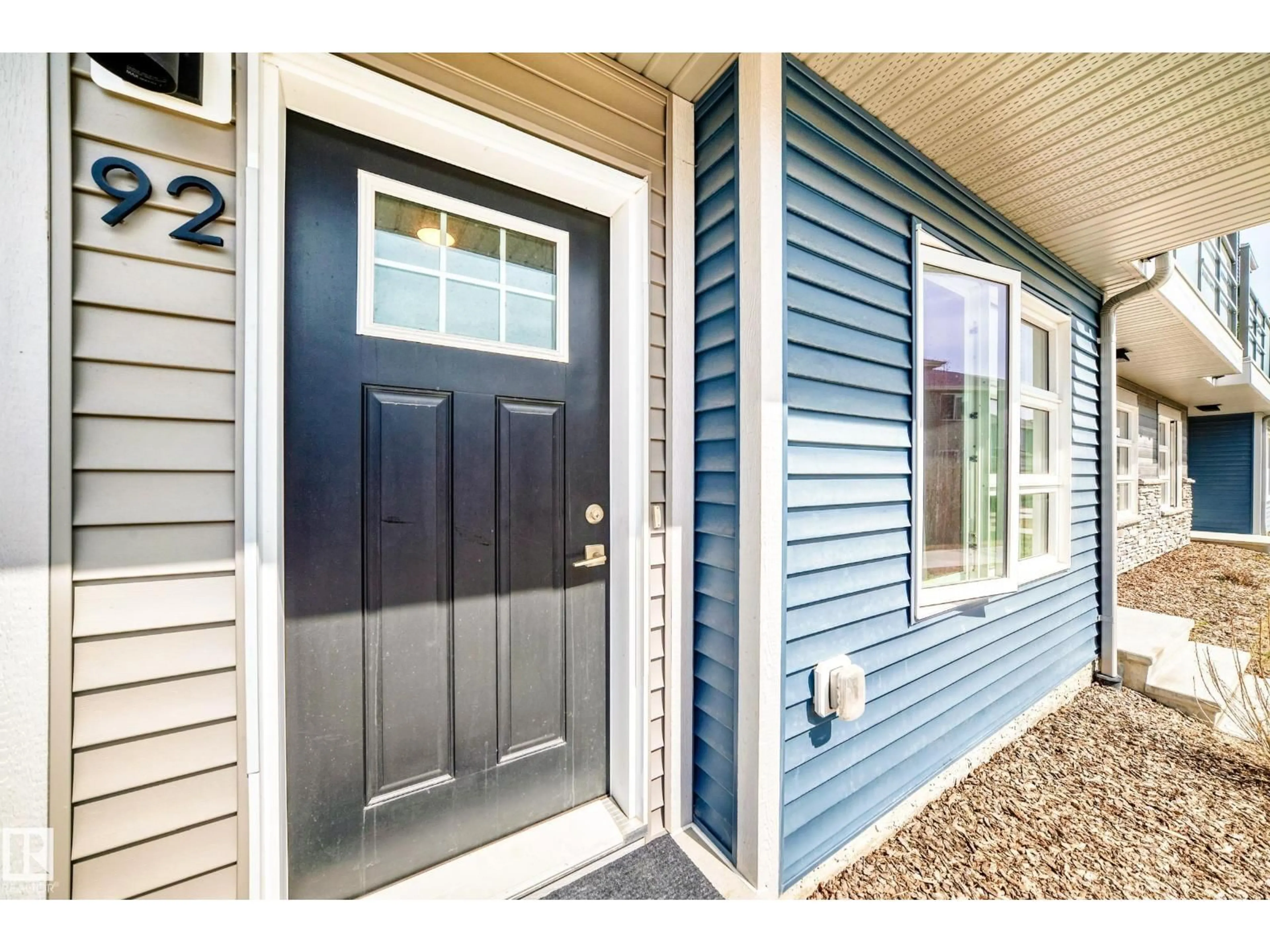 Home with vinyl exterior material, street for 92 17635 58 ST NW, Edmonton Alberta T5Y4C2