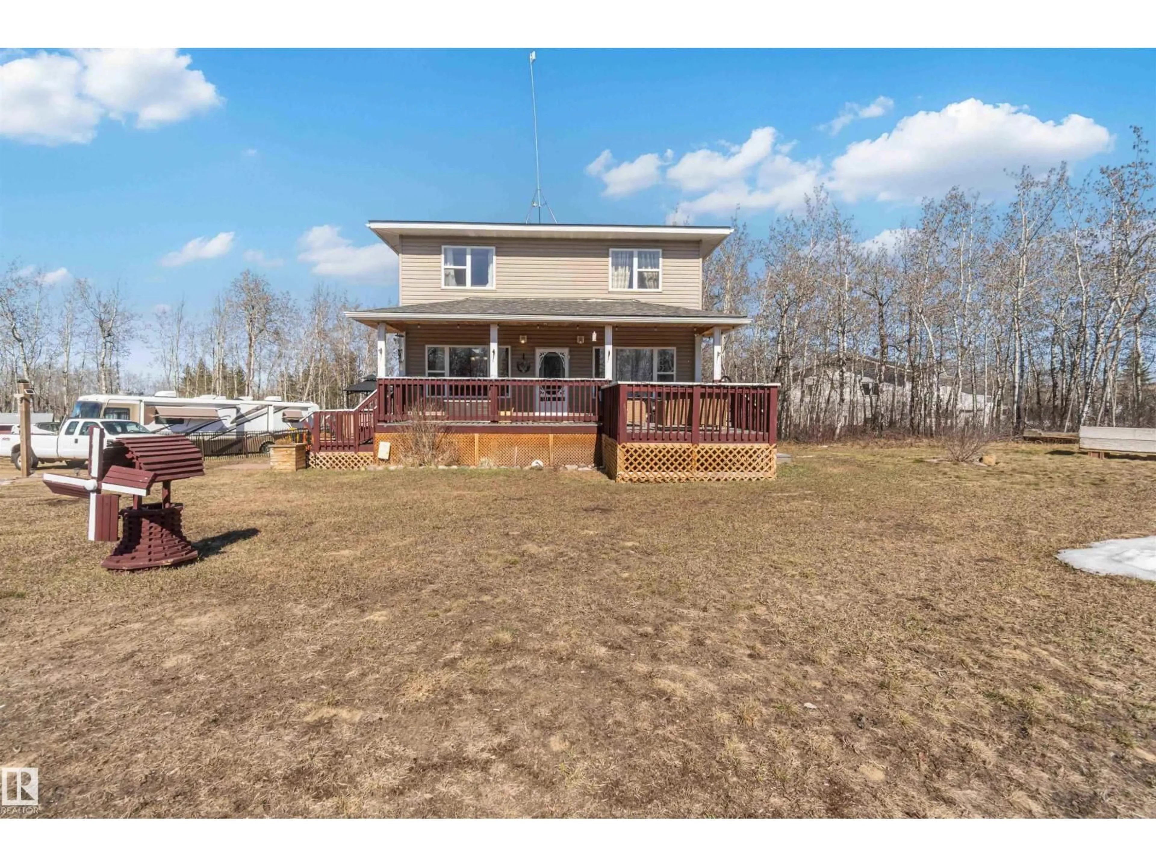 A pic from outside/outdoor area/front of a property/back of a property/a pic from drone, water/lake/river/ocean view for 15 22515 TWP RD 575A, Rural Sturgeon County Alberta T0A1N6