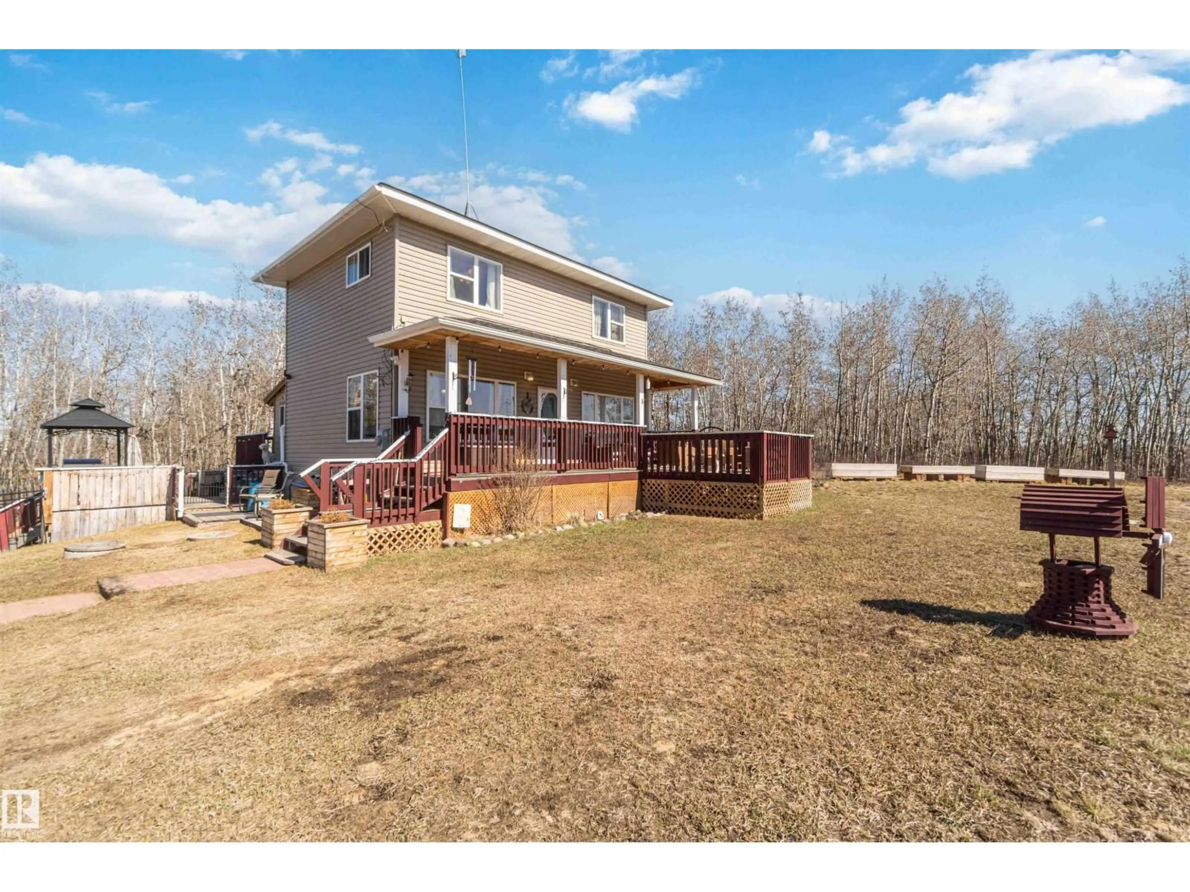 A pic from outside/outdoor area/front of a property/back of a property/a pic from drone, unknown for 15 22515 TWP RD 575A, Rural Sturgeon County Alberta T0A1N6