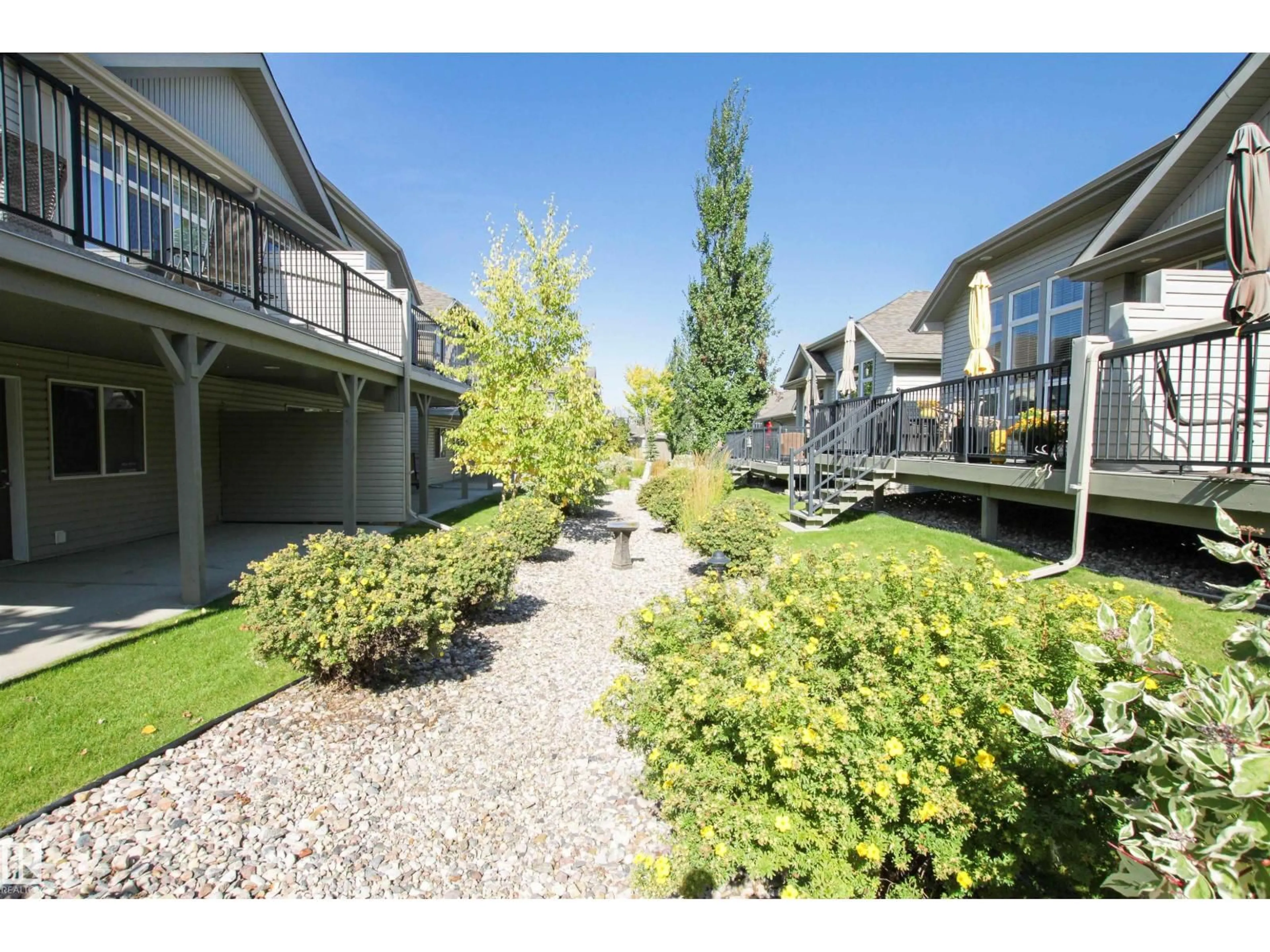 Patio, water/lake/river/ocean view for #61 - 700 REGENCY DR, Sherwood Park Alberta T8A6N3