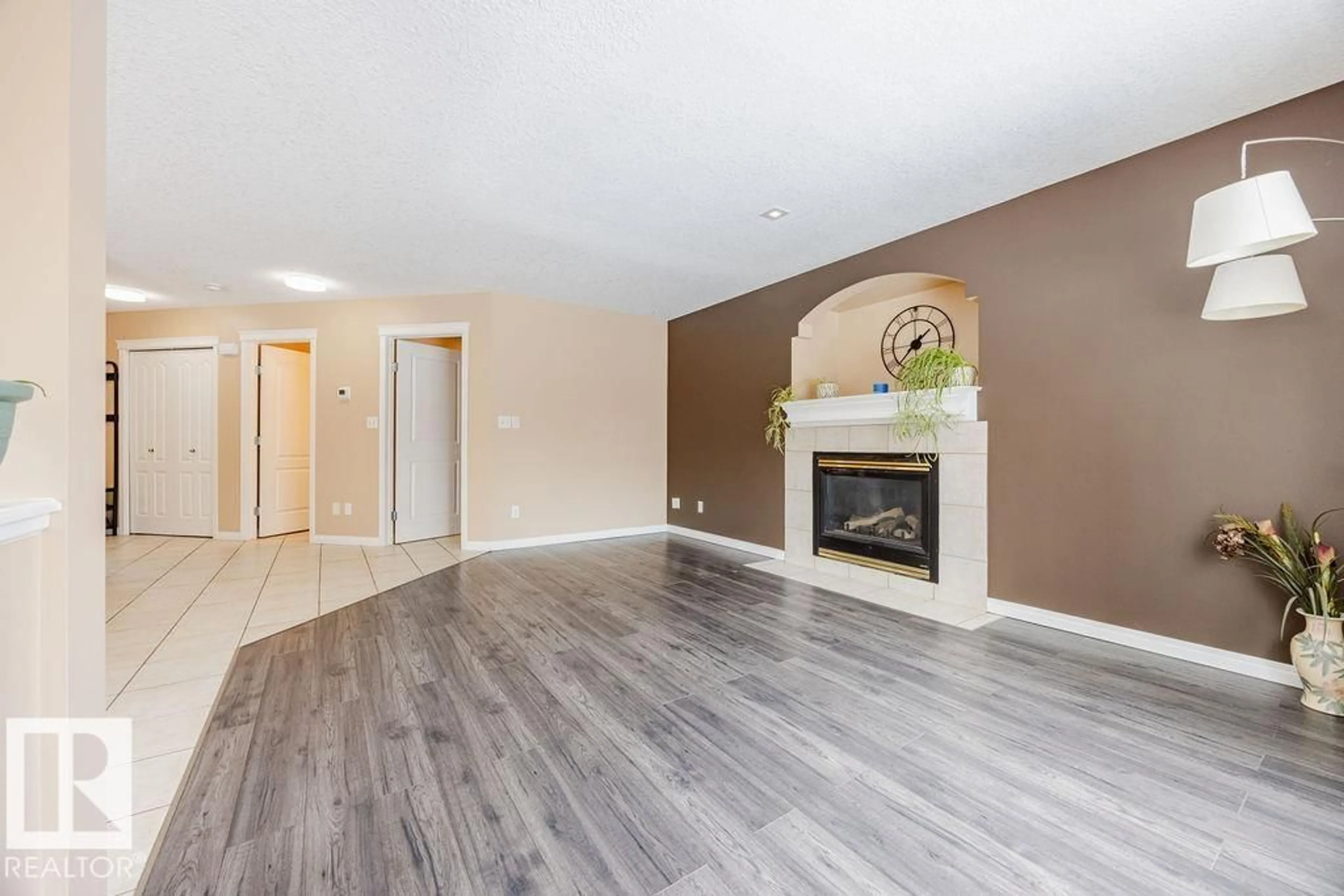 Living room with furniture, wood/laminate floor for 7 DOUCETTE PL, St. Albert Alberta T8N6S7