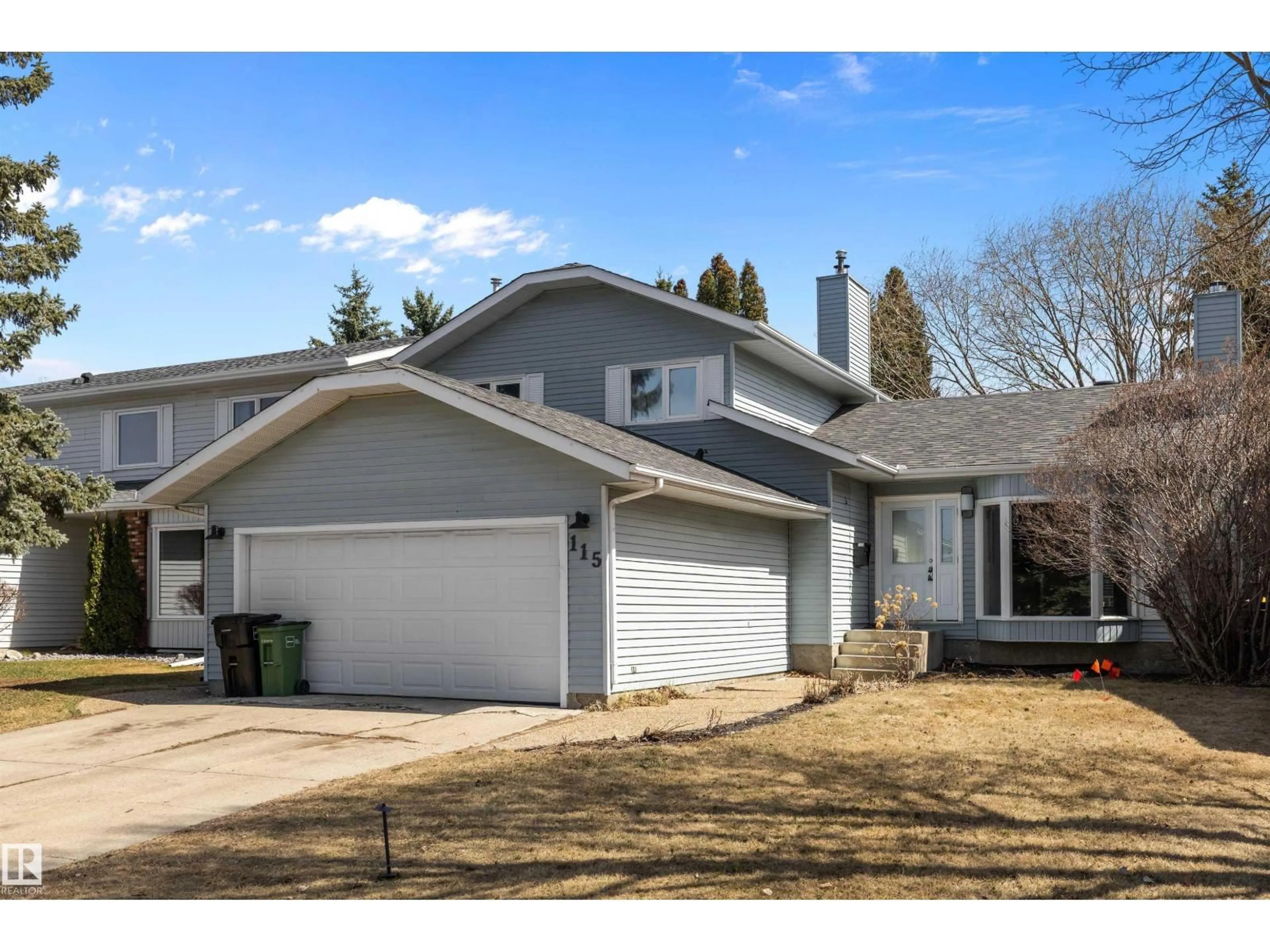 Home with vinyl exterior material, street for 115 WALKER RD, Edmonton Alberta T5T4C2