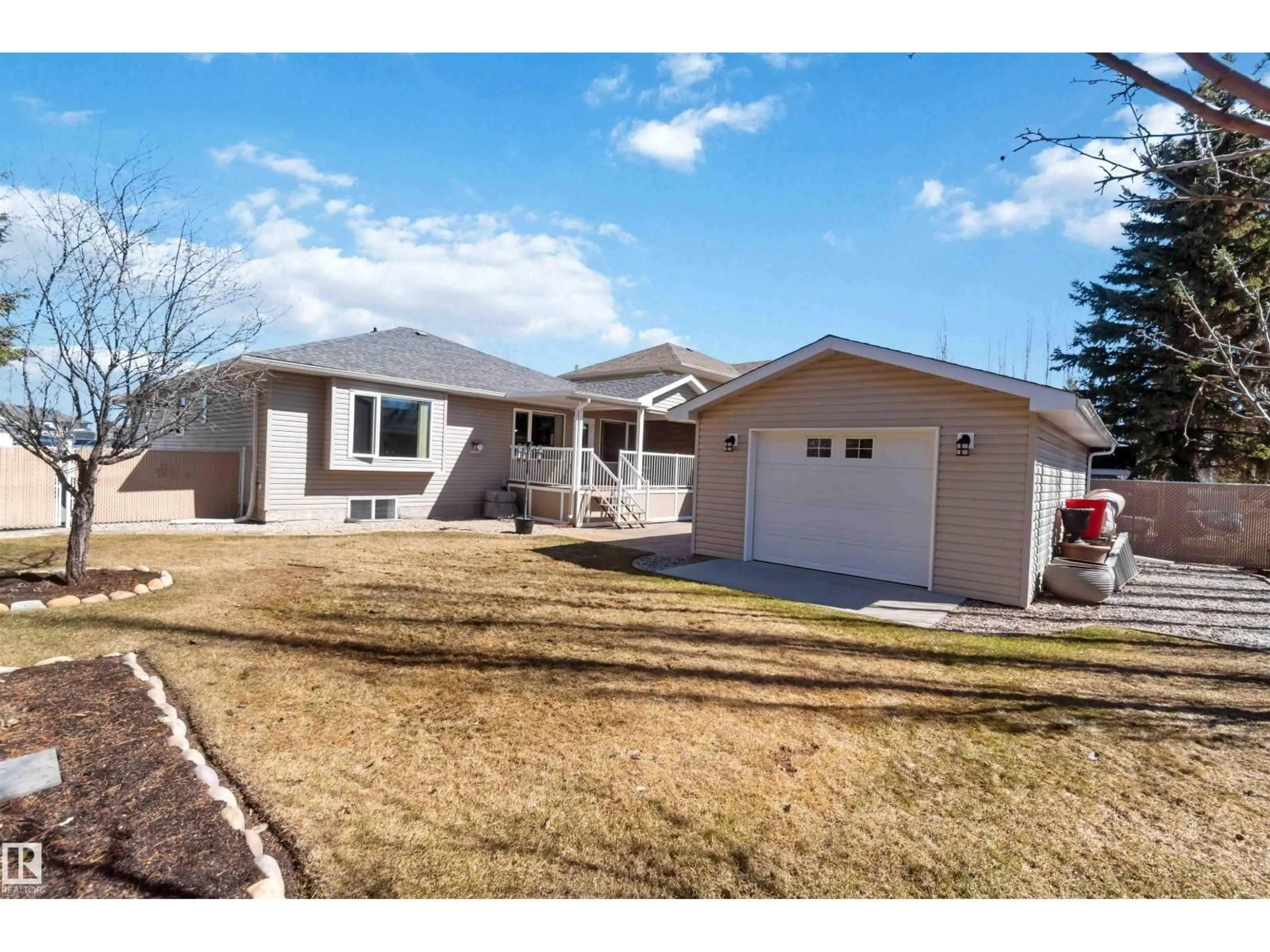 Home with vinyl exterior material, street for 320 ST. JOHN ST, Cardiff Alberta T8R2G5