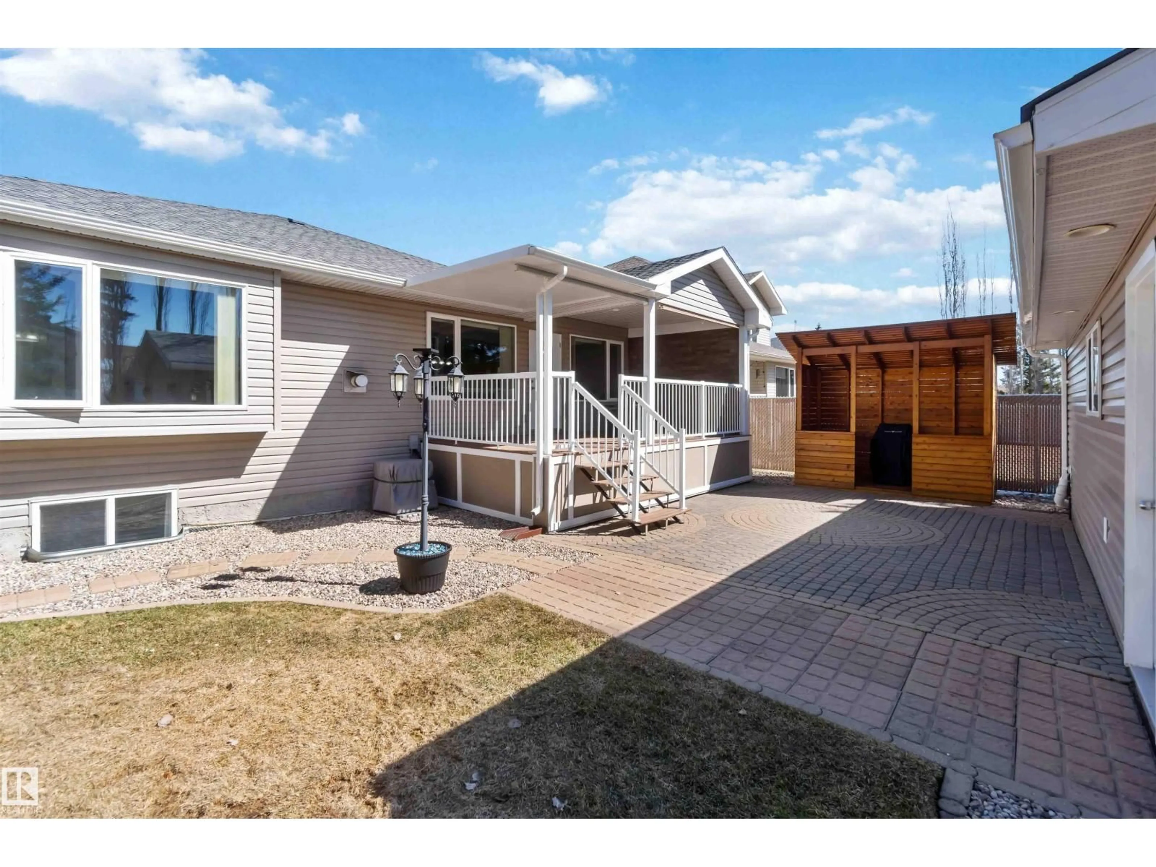 Home with vinyl exterior material, street for 320 ST. JOHN ST, Cardiff Alberta T8R2G5