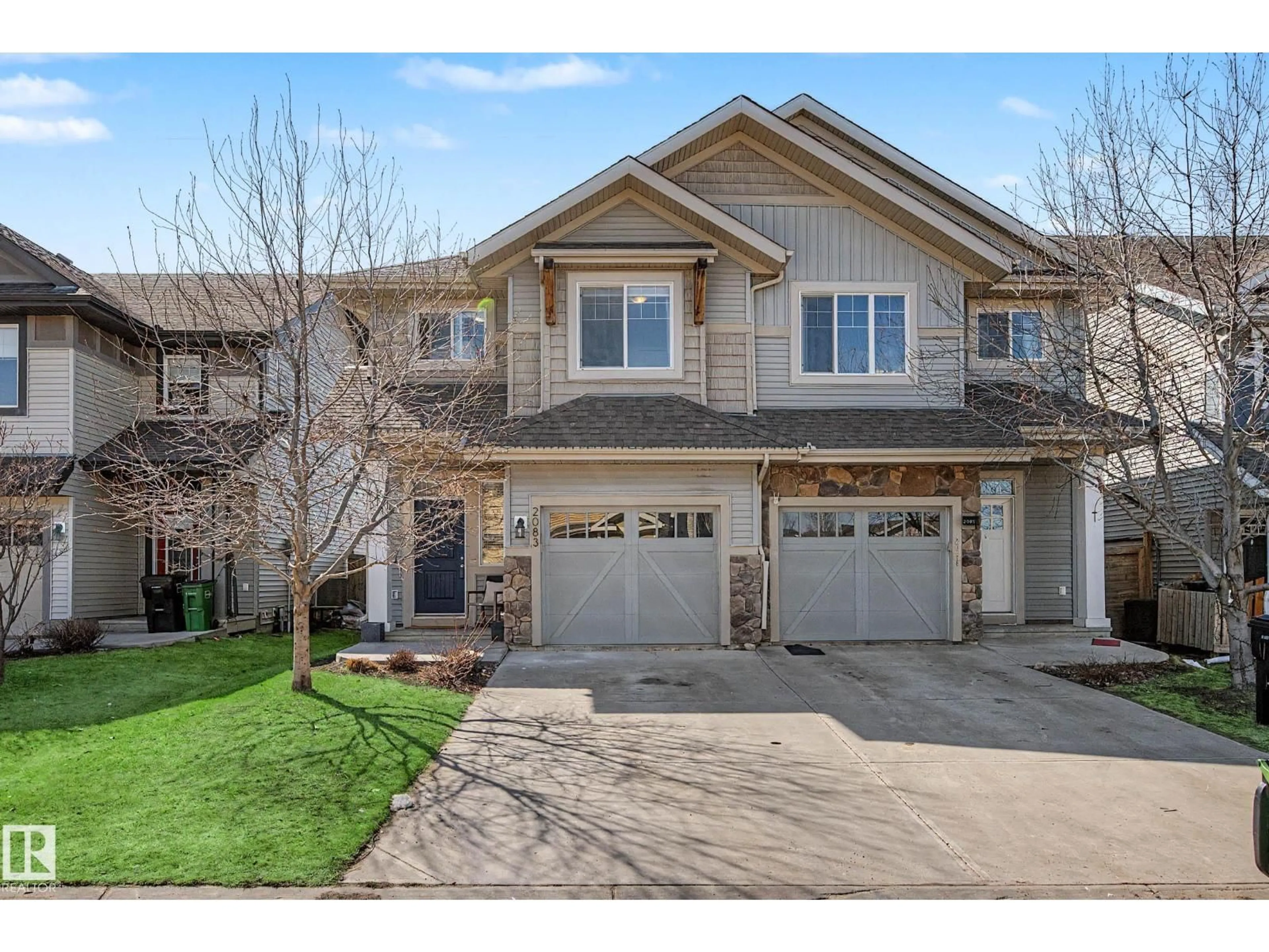 Home with brick exterior material, street for 2083 CHALMERS WY, Edmonton Alberta T6W2E9