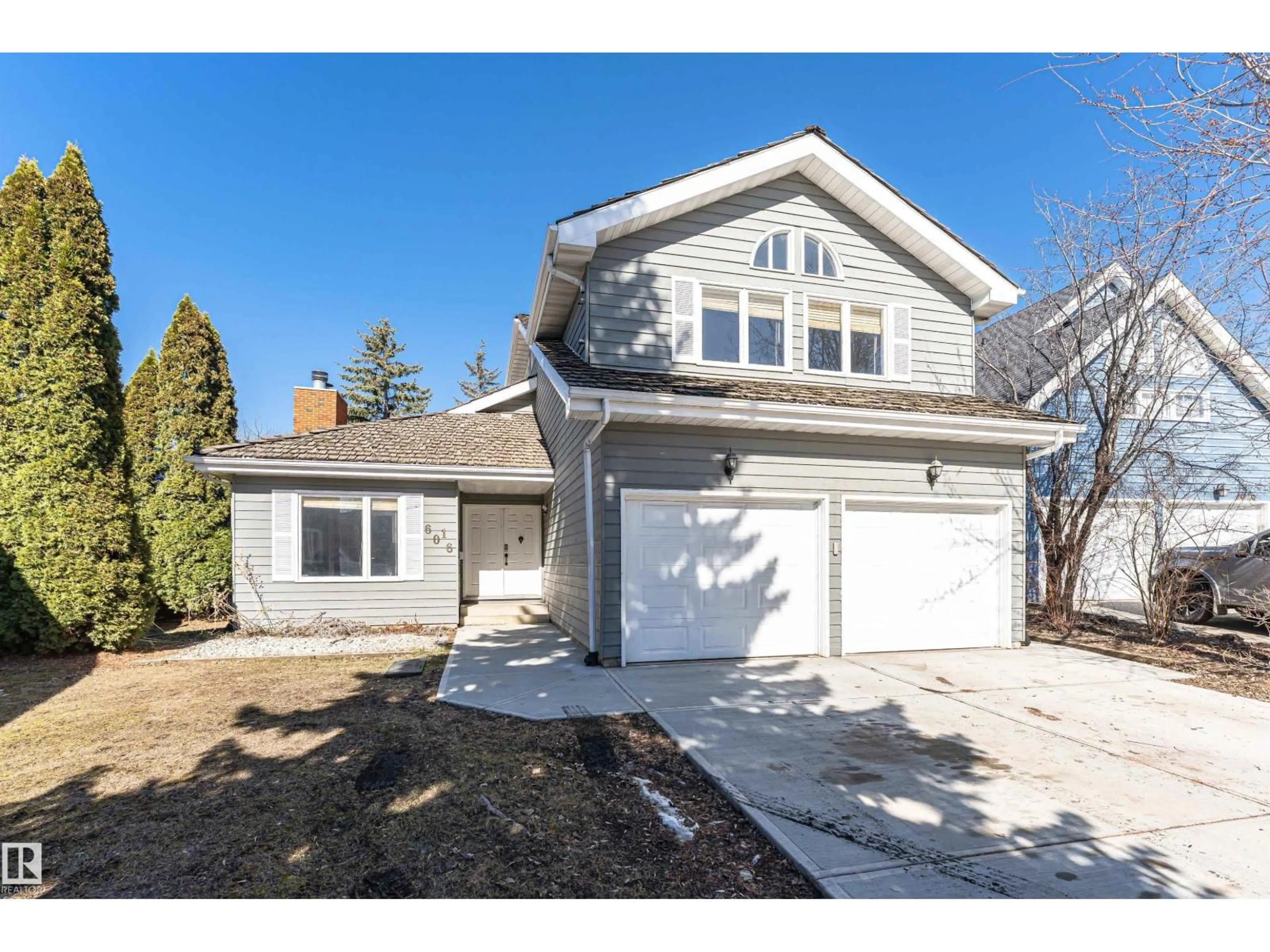 Home with vinyl exterior material, street for NW - 6016 177 ST, Edmonton Alberta T6M1H8