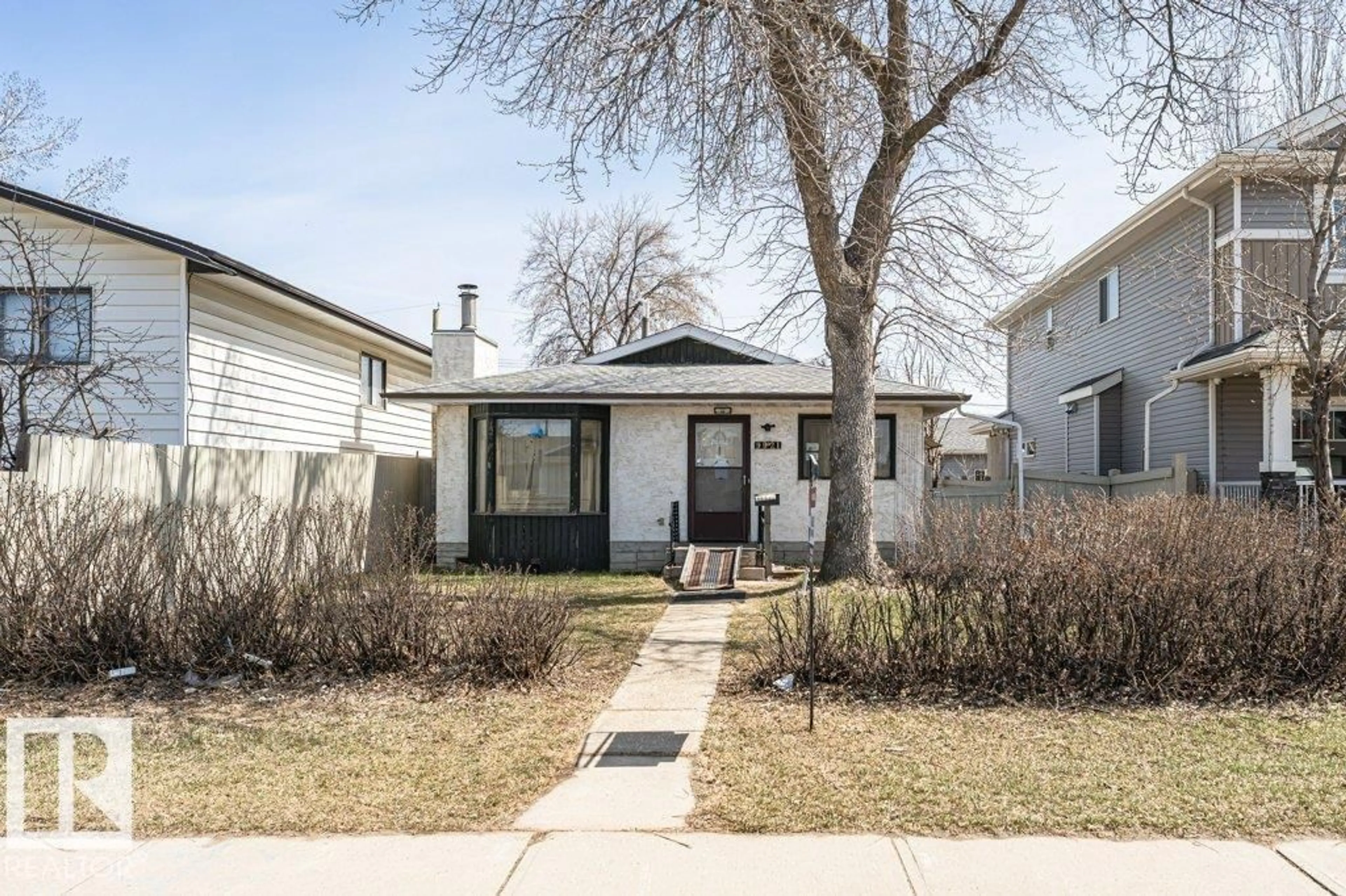 Home with vinyl exterior material, street for NW - 9921 162 ST, Edmonton Alberta T5P3L3