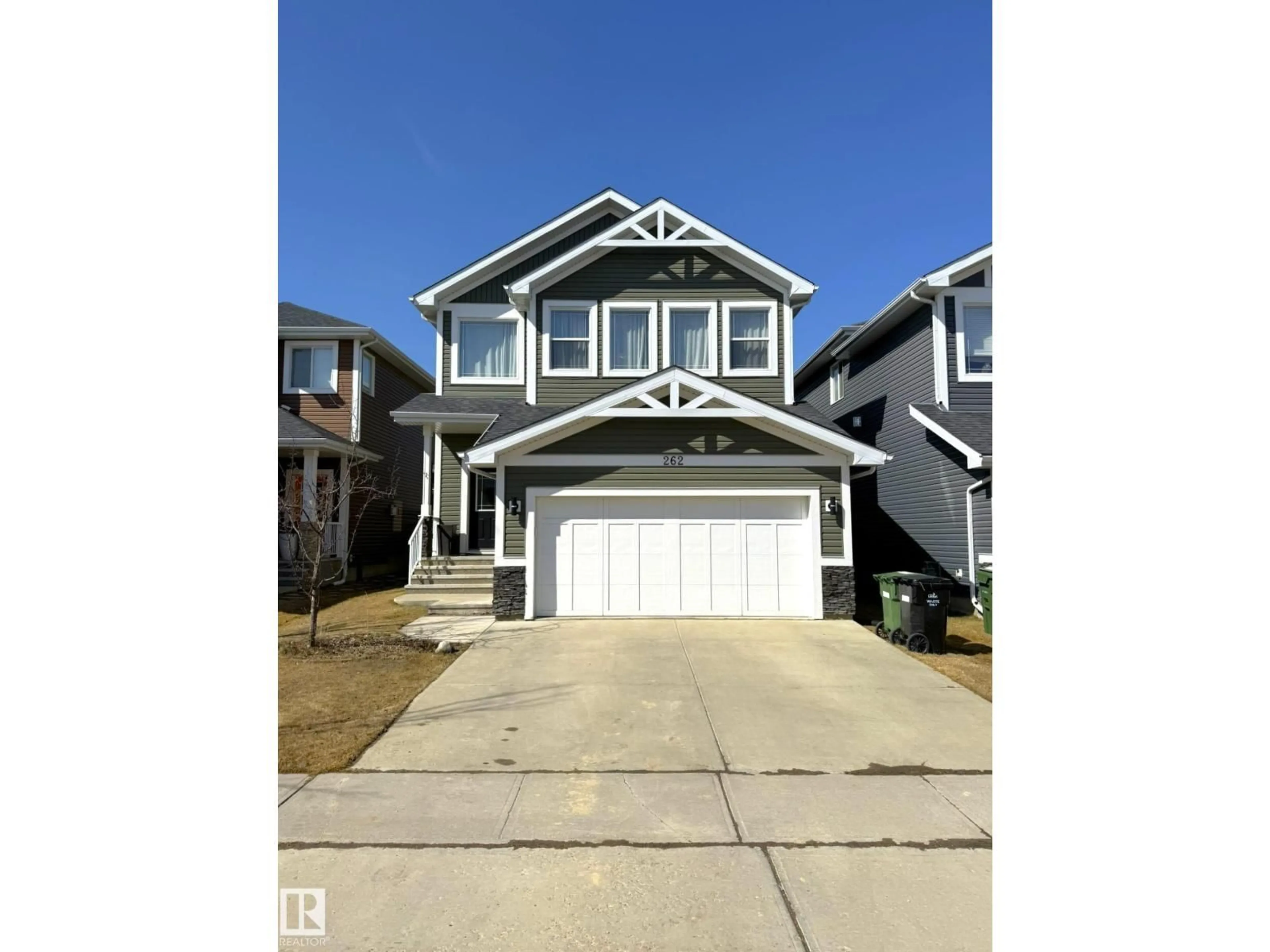 Home with vinyl exterior material, street for 262 SHEPPARD CI, Leduc Alberta T9E0T5