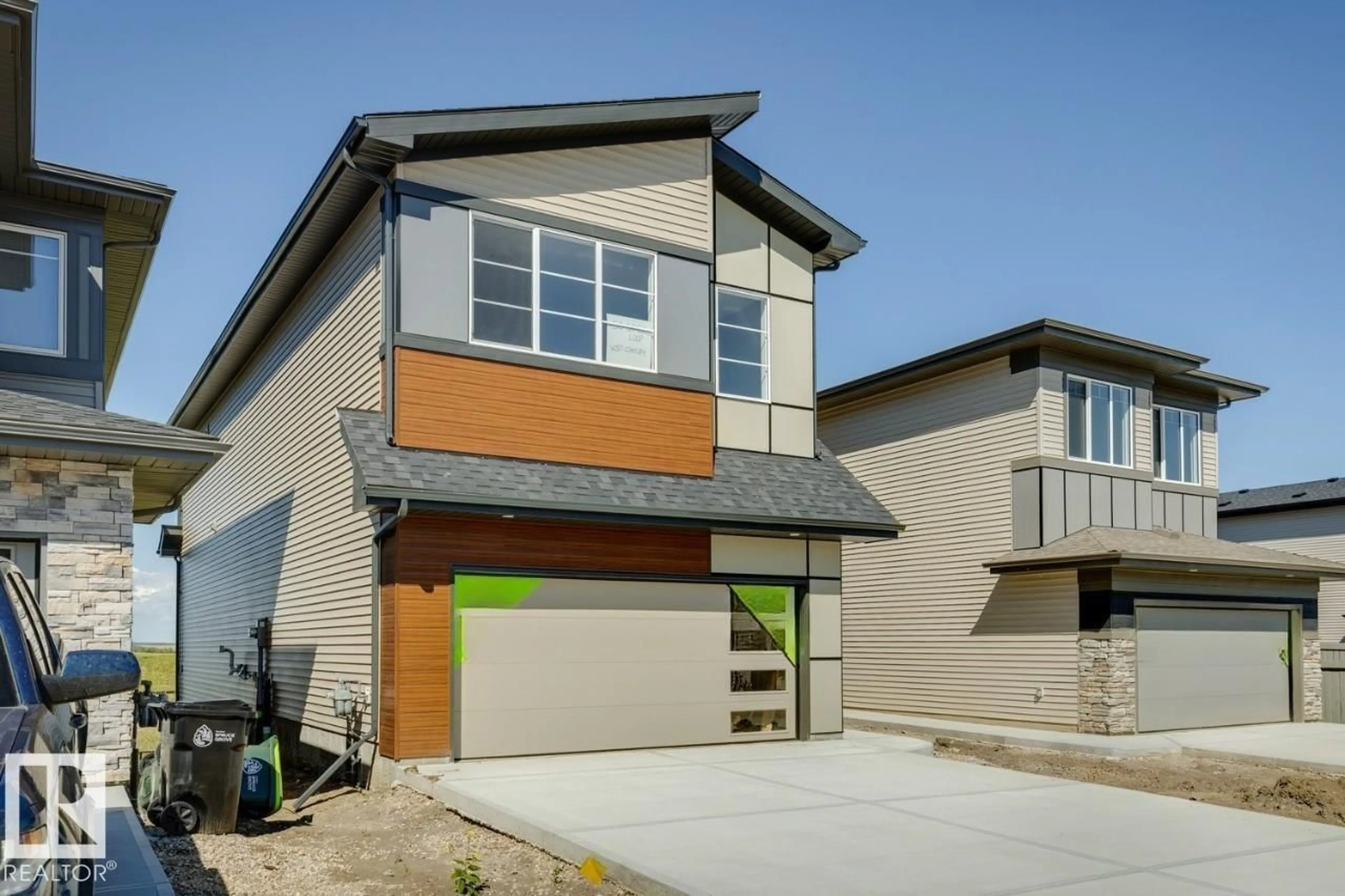 Home with vinyl exterior material, street for 50 GAMBEL LO, Spruce Grove Alberta T7X0C9