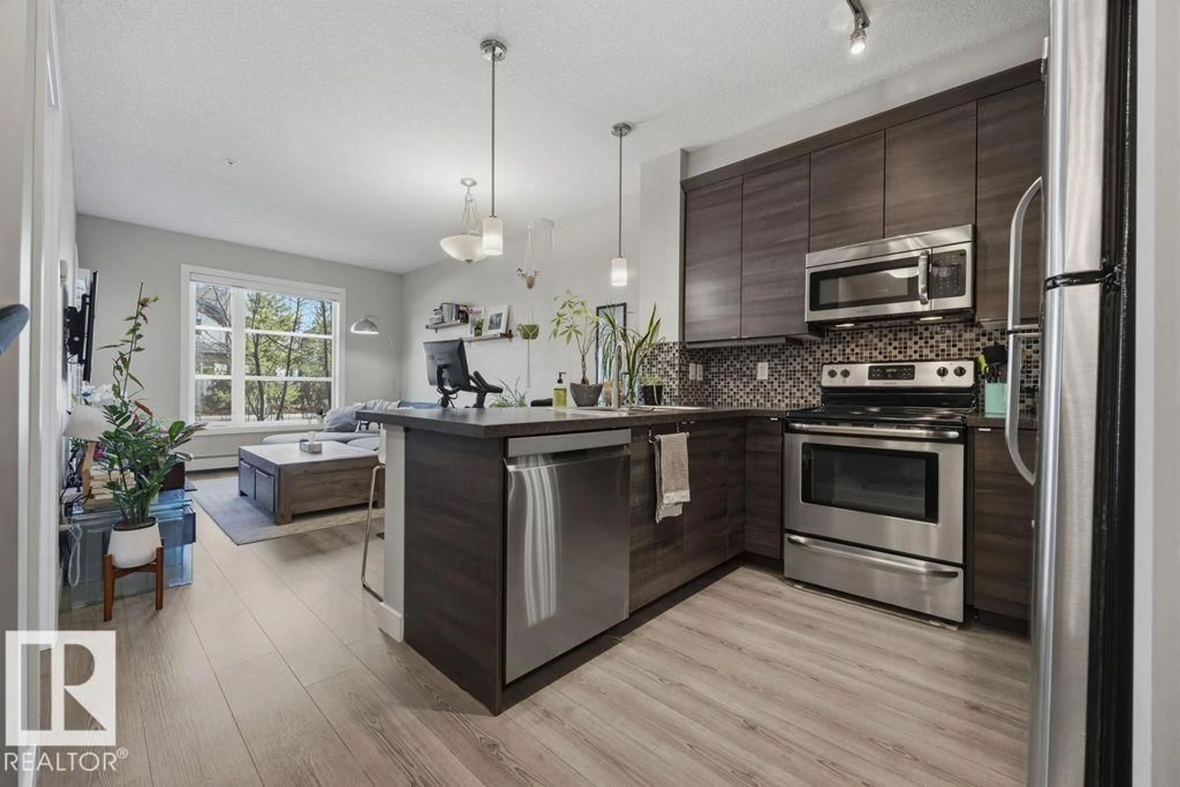 Open concept kitchen, unknown for #108 - 2588 ANDERSON WY, Edmonton Alberta T6W0R2