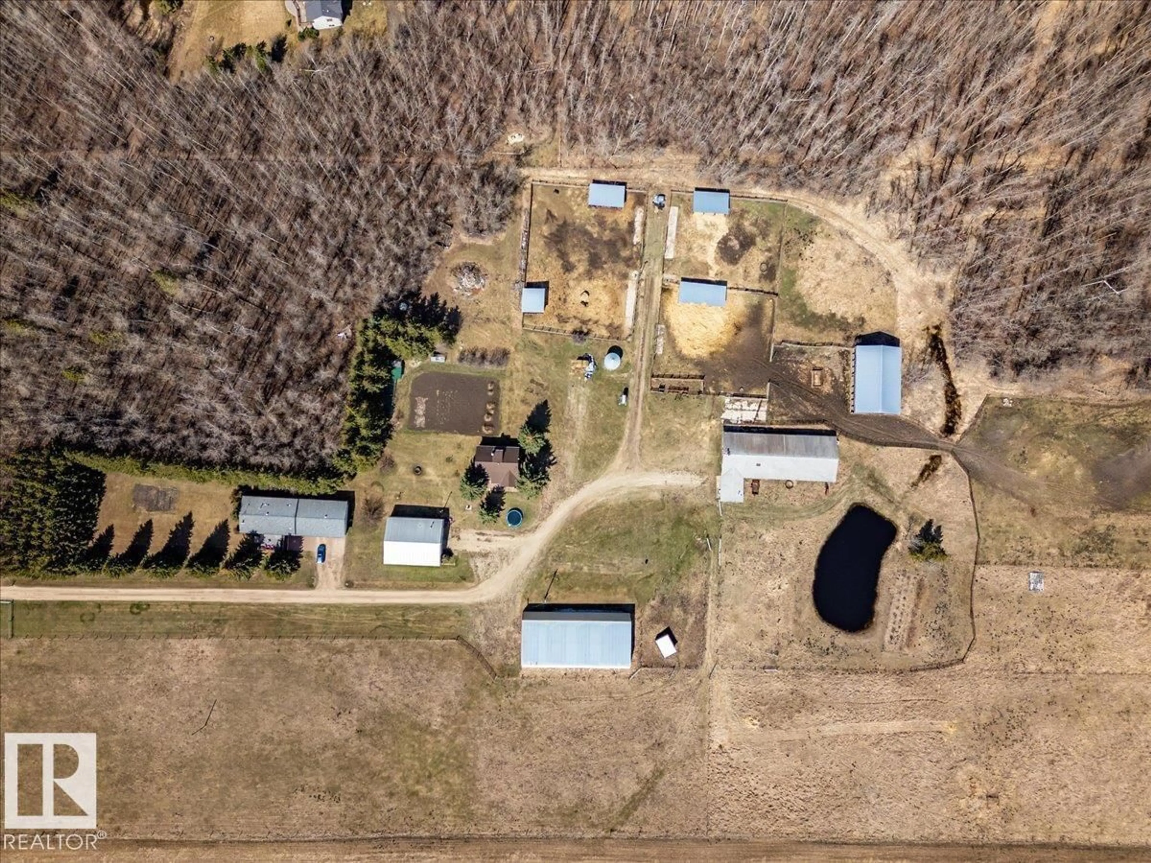 A pic from outside/outdoor area/front of a property/back of a property/a pic from drone, unknown for 49059 RGE ROAD 265, Rural Leduc County Alberta T0C0V0