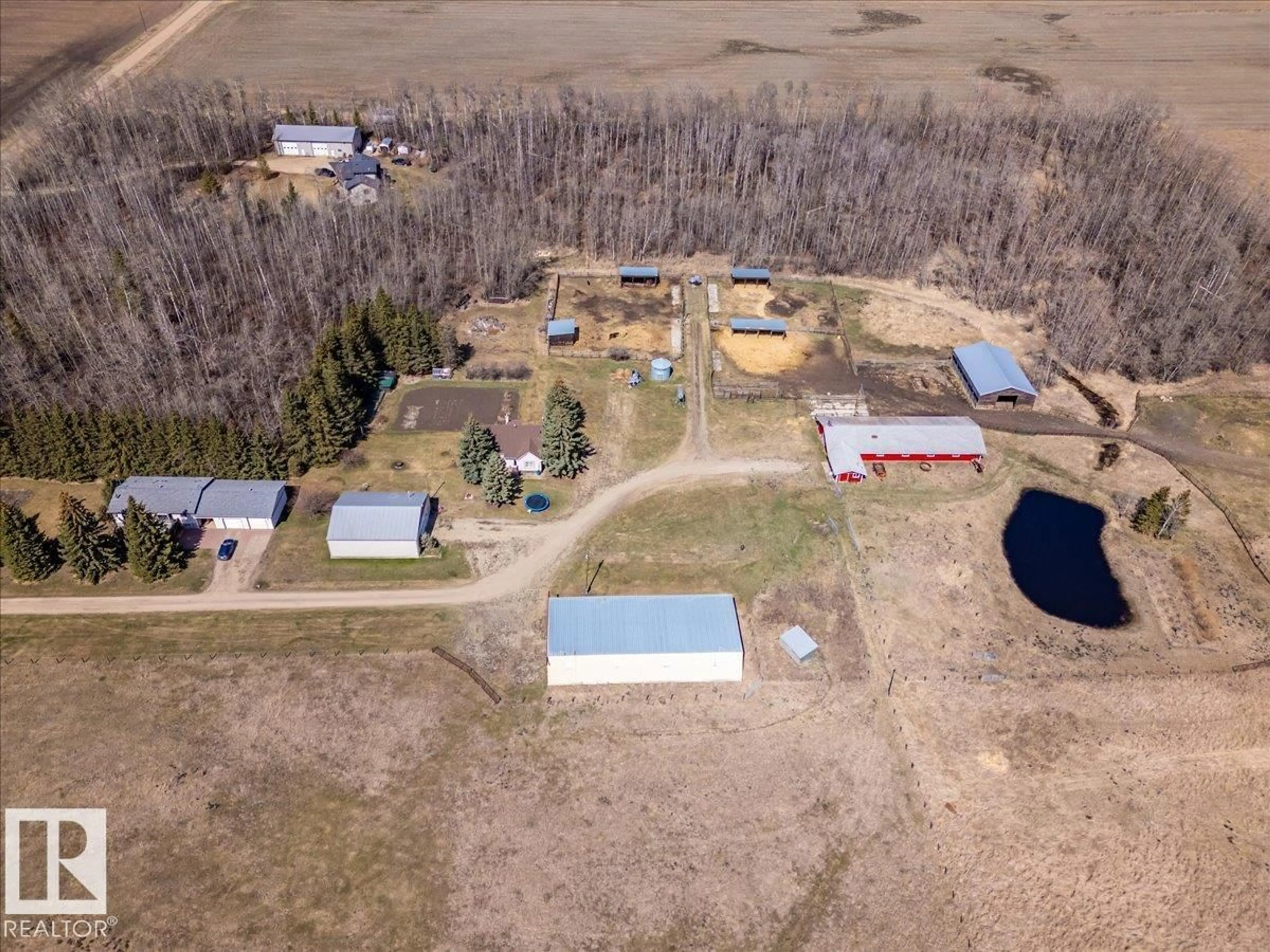 A pic from outside/outdoor area/front of a property/back of a property/a pic from drone, unknown for 49059 RGE ROAD 265, Rural Leduc County Alberta T0C0V0