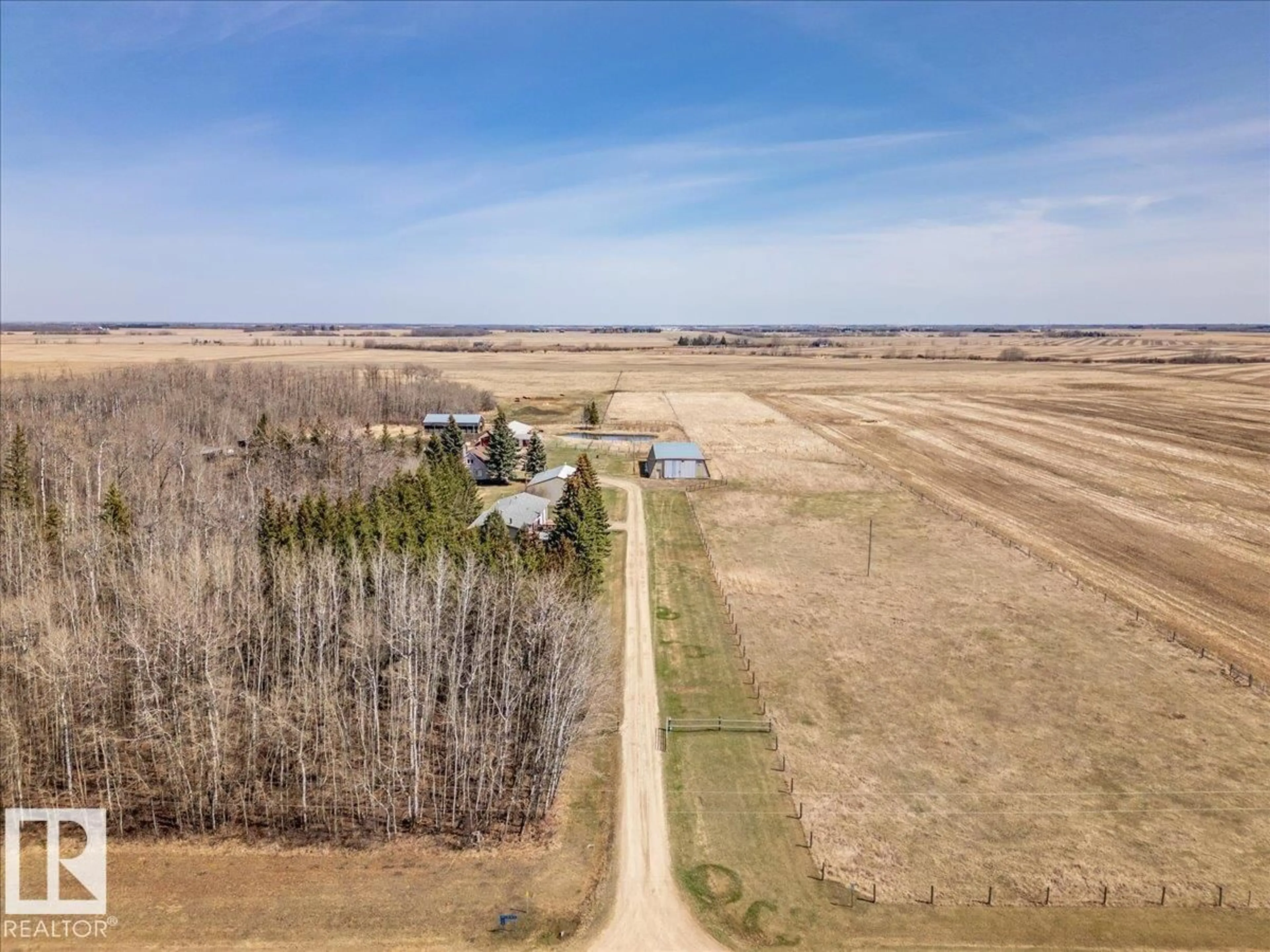 A pic from outside/outdoor area/front of a property/back of a property/a pic from drone, unknown for 49059 RGE ROAD 265, Rural Leduc County Alberta T0C0V0