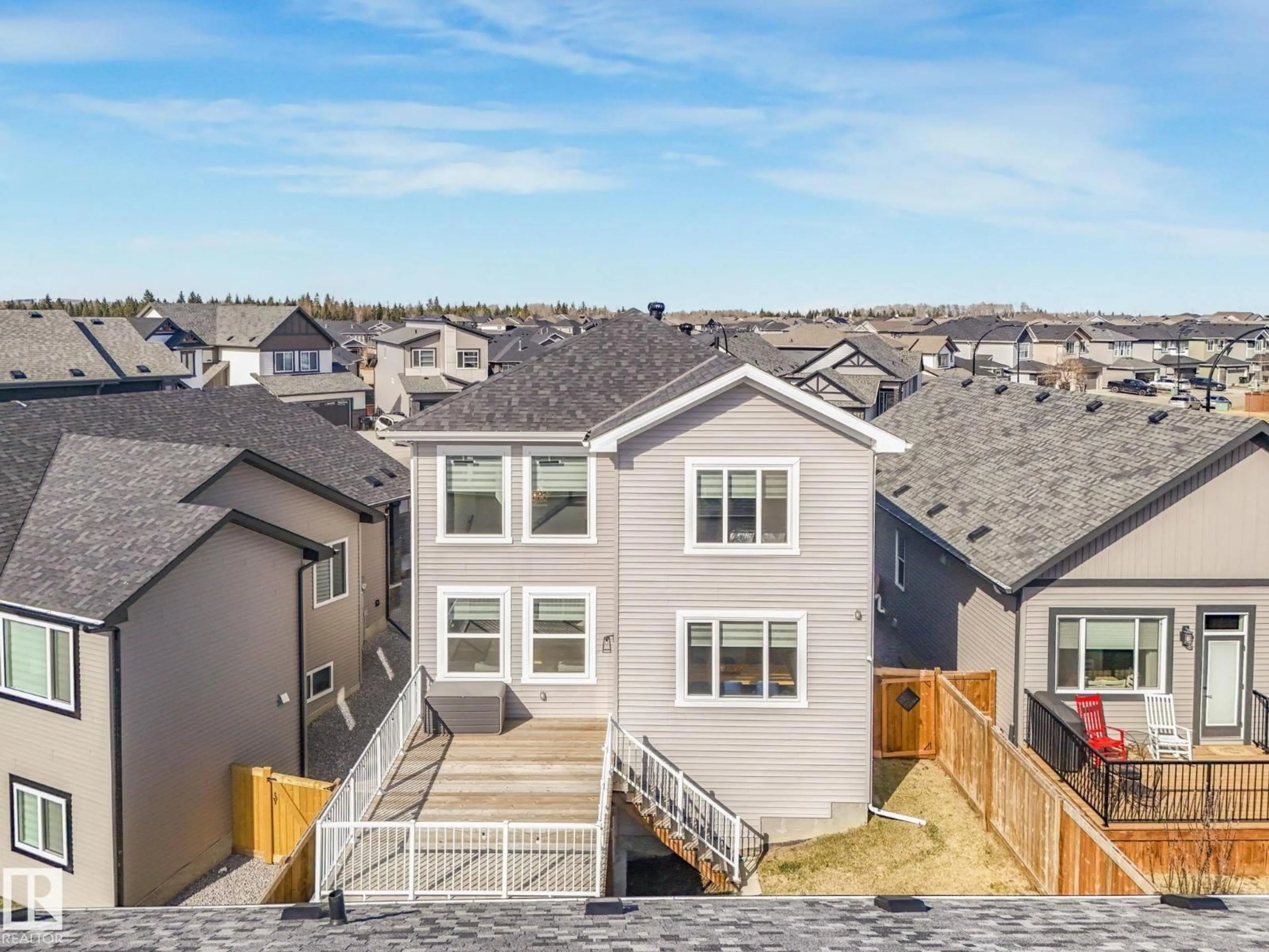 A pic from outside/outdoor area/front of a property/back of a property/a pic from drone, mountain view for 19 HOLT CV, Spruce Grove Alberta T7X2W9