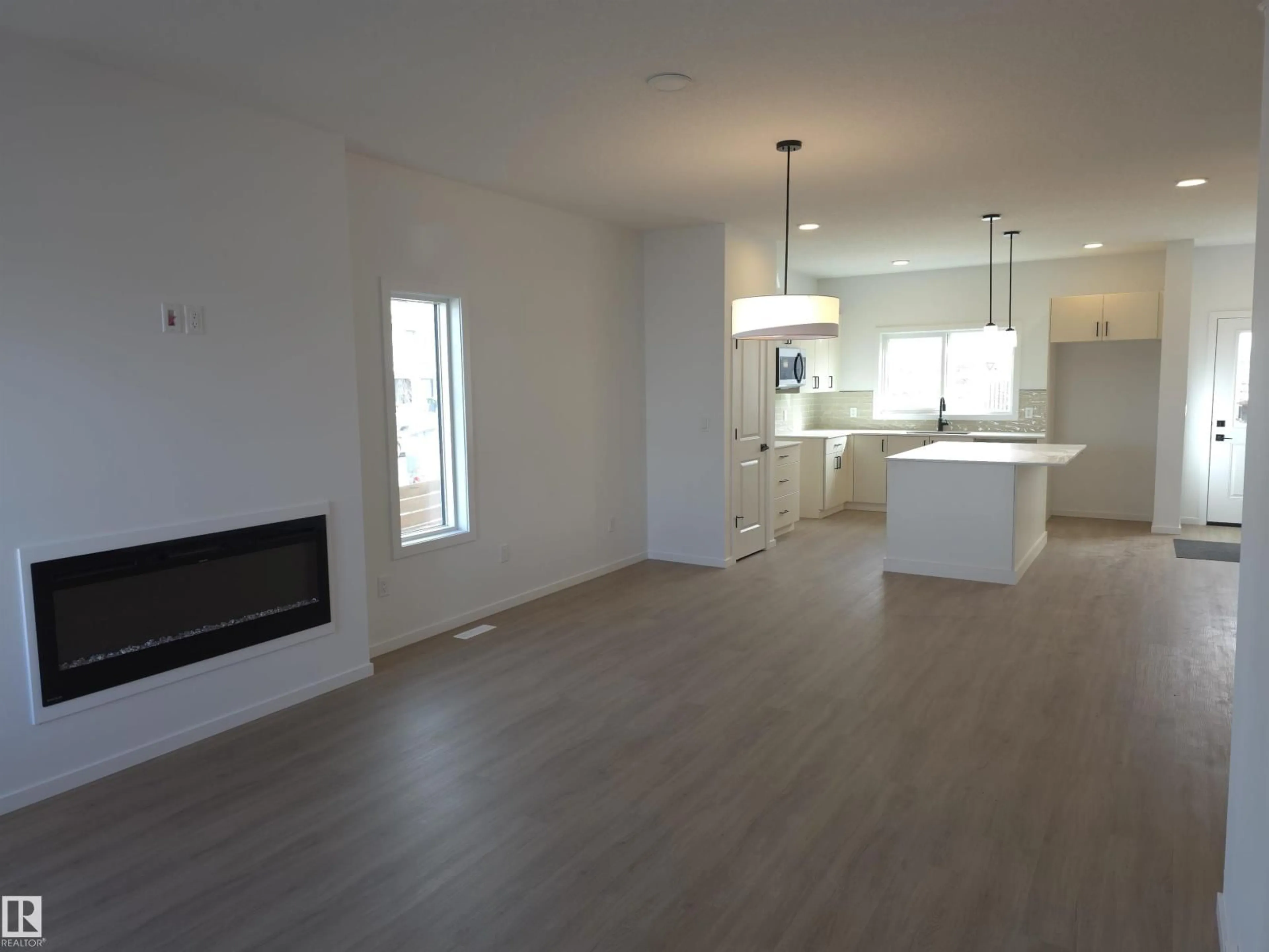 Open concept kitchen, wood/laminate floor for 43 ETON LI, Spruce Grove Alberta T7X4A9