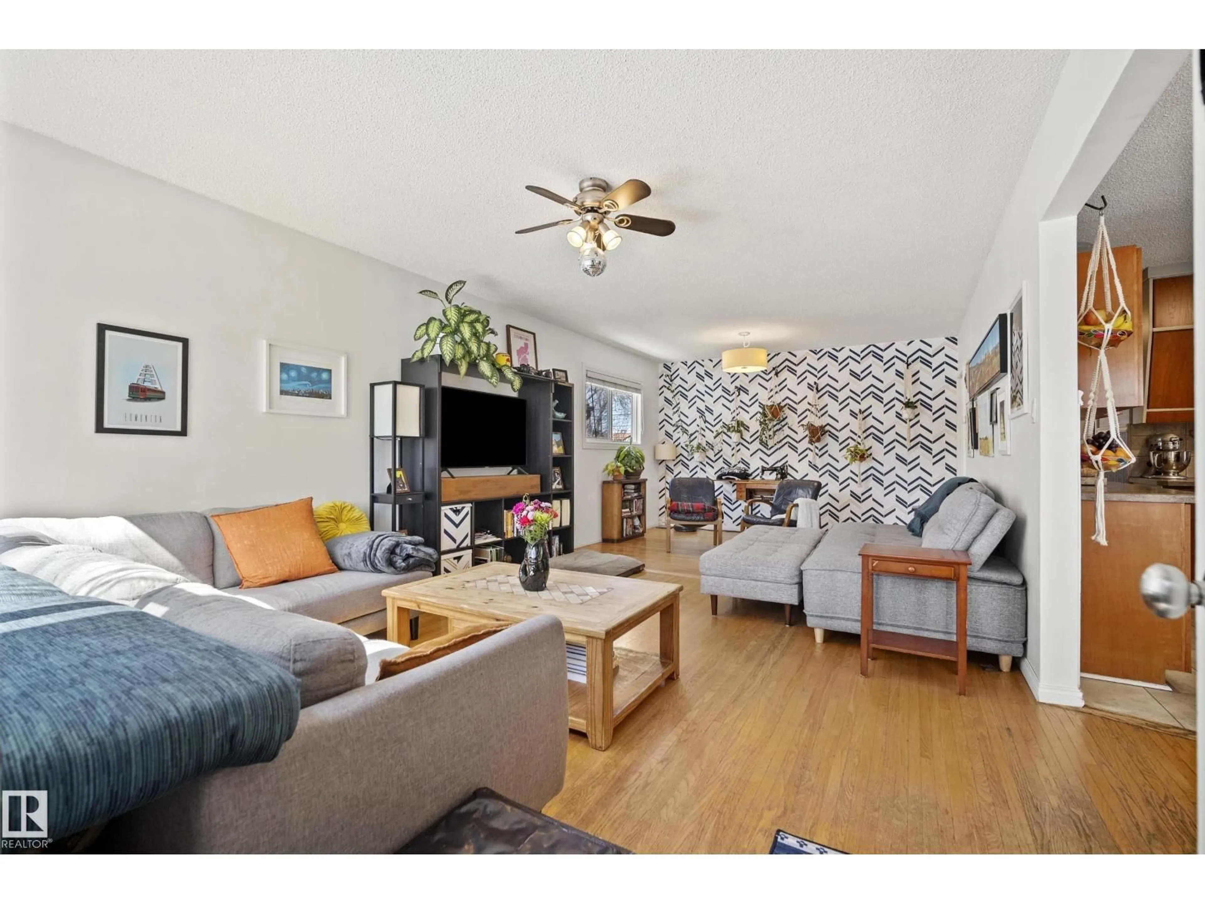Living room with furniture, unknown for 8946 80 AV, Edmonton Alberta T6C0T7