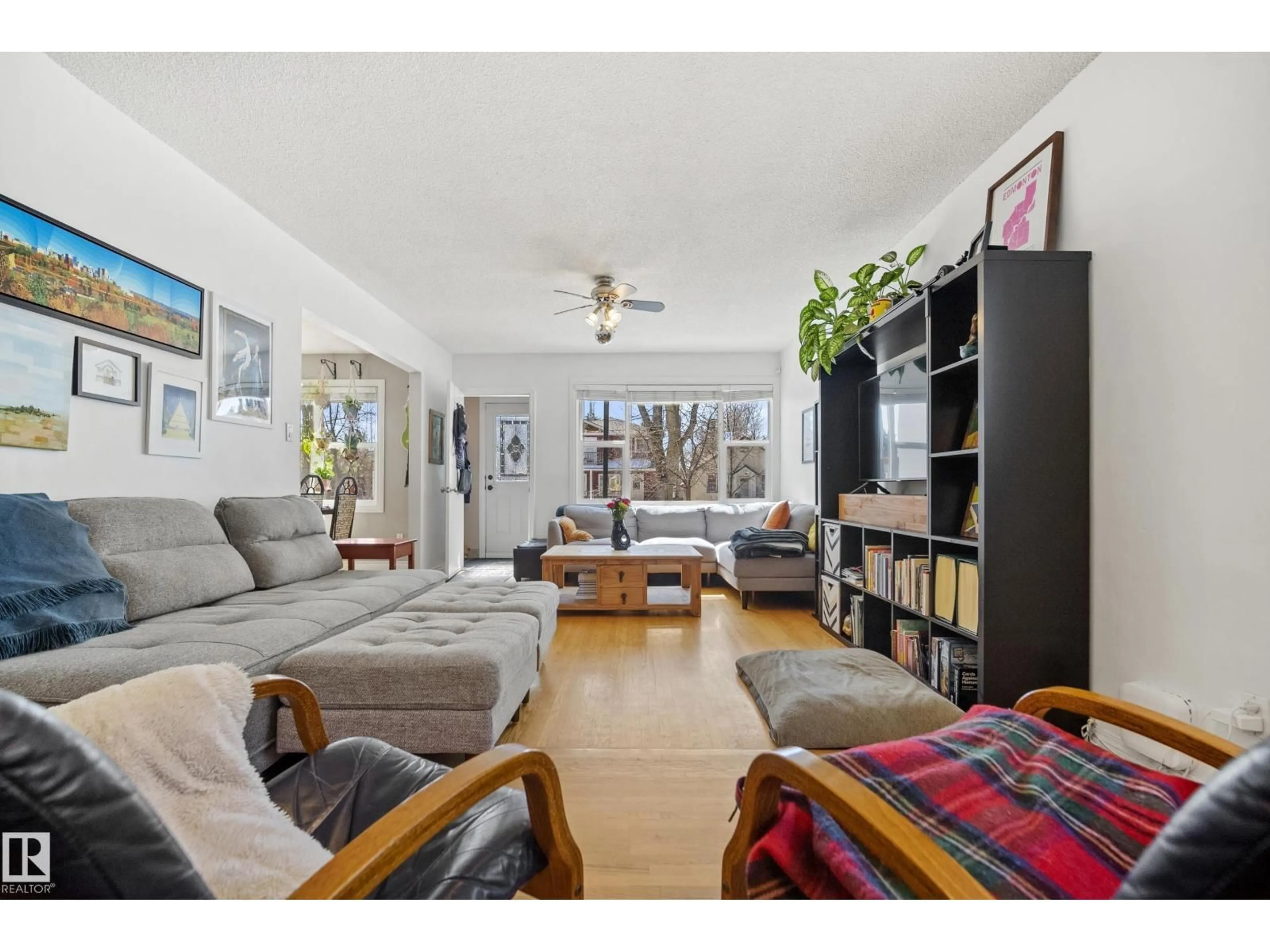 Living room with furniture, unknown for 8946 80 AV, Edmonton Alberta T6C0T7