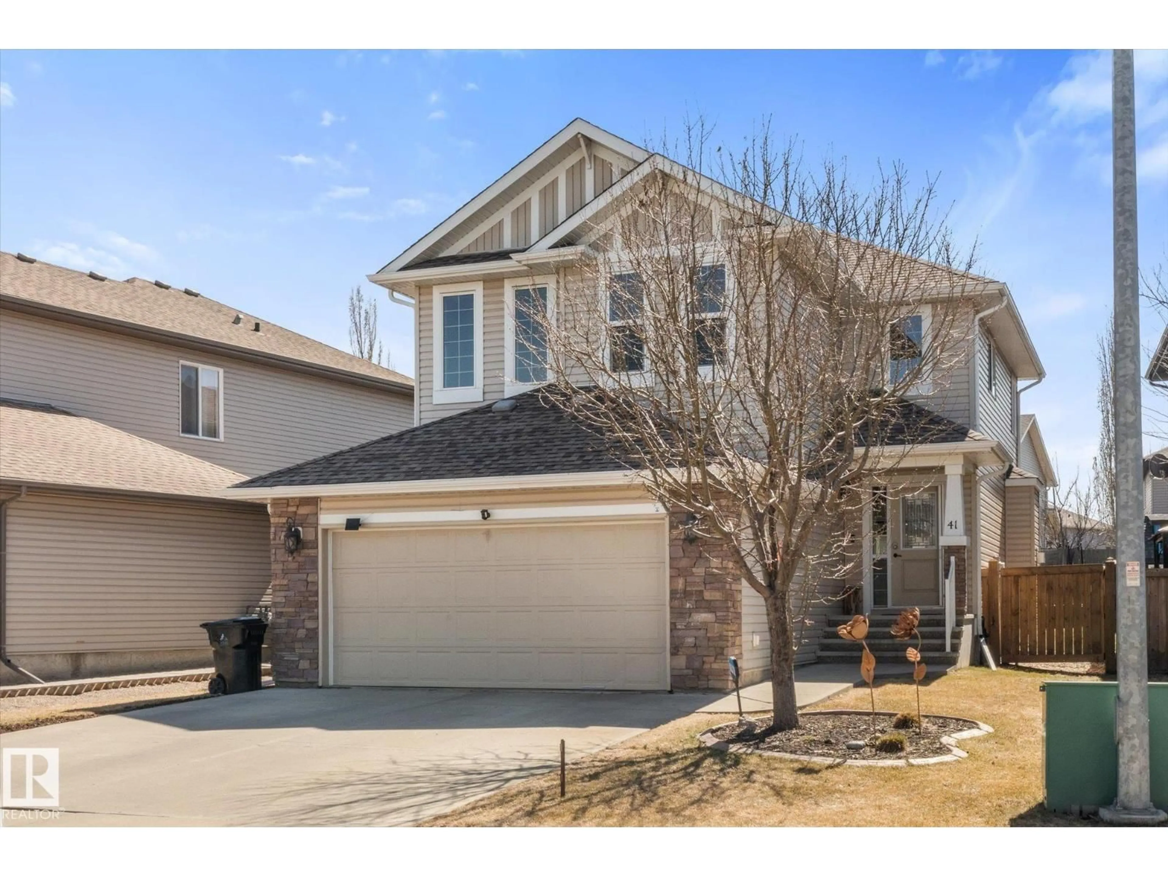 Home with vinyl exterior material, street for 41 HERON CRESCENT, Spruce Grove Alberta T7X0G1