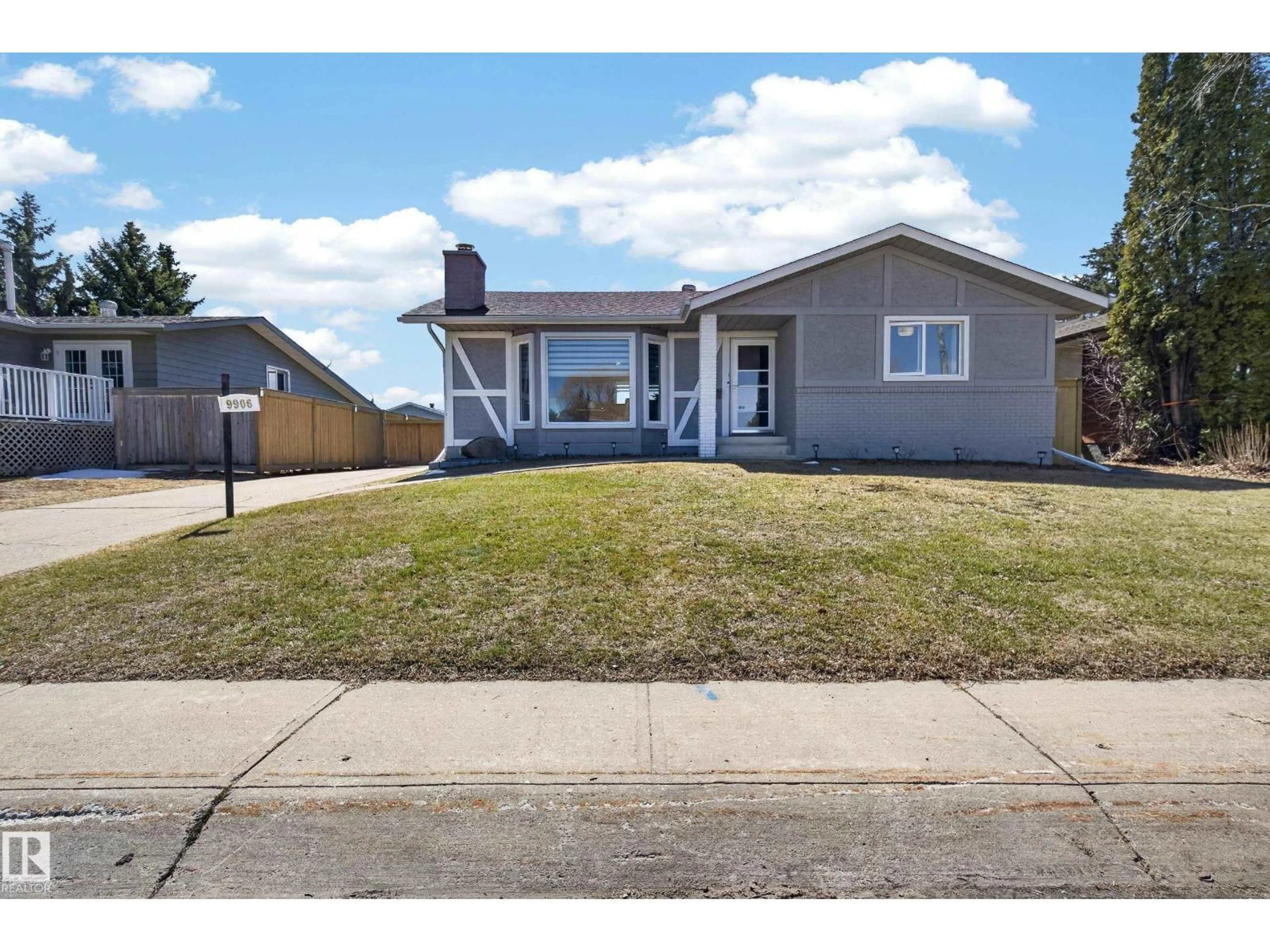 Home with vinyl exterior material, street for 9906 85 ST, Fort Saskatchewan Alberta T8L3K1