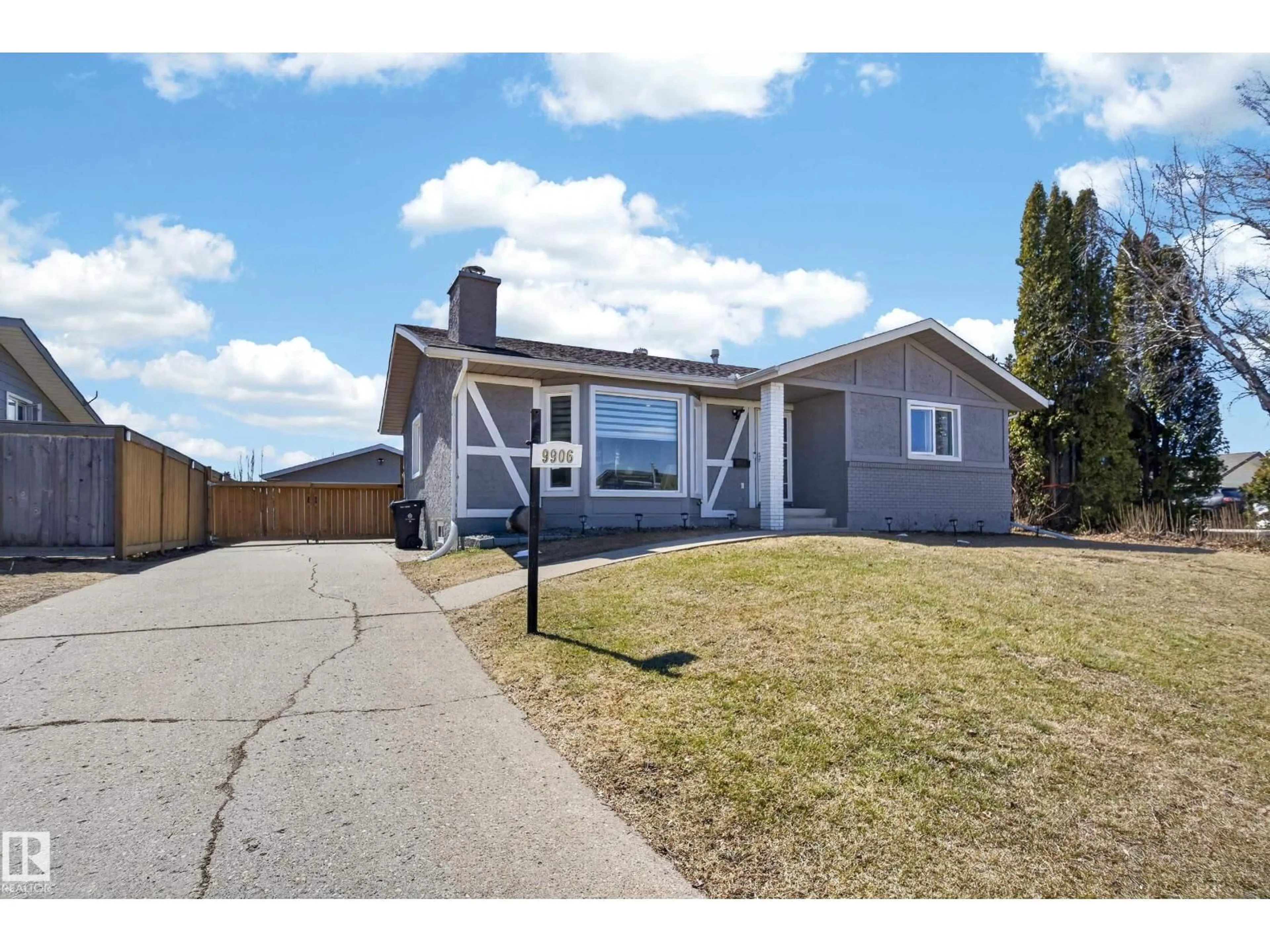 Home with vinyl exterior material, street for 9906 85 ST, Fort Saskatchewan Alberta T8L3K1