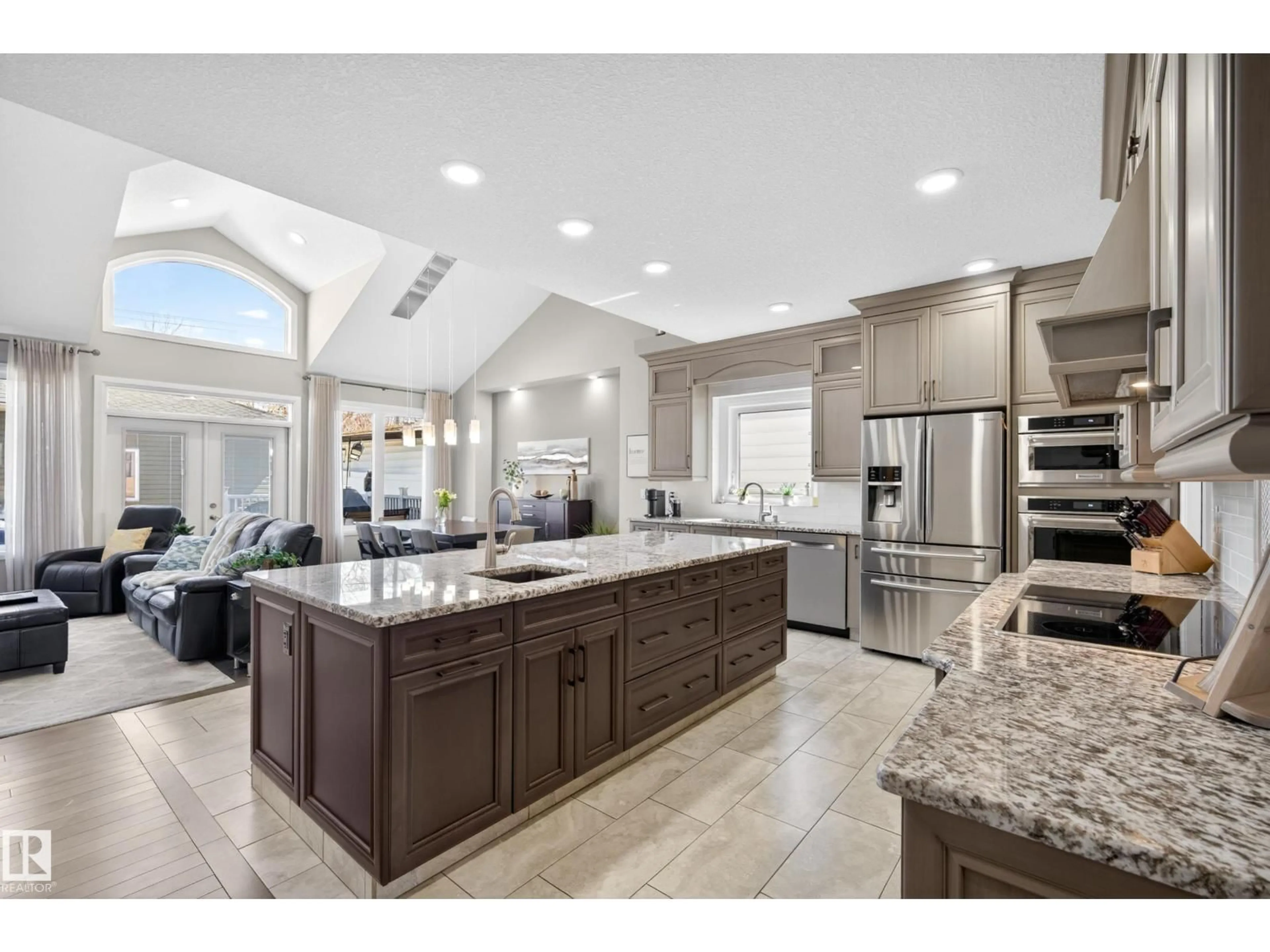 Open concept kitchen, ceramic/tile floor for 9245 87 ST, Edmonton Alberta T6C3H7