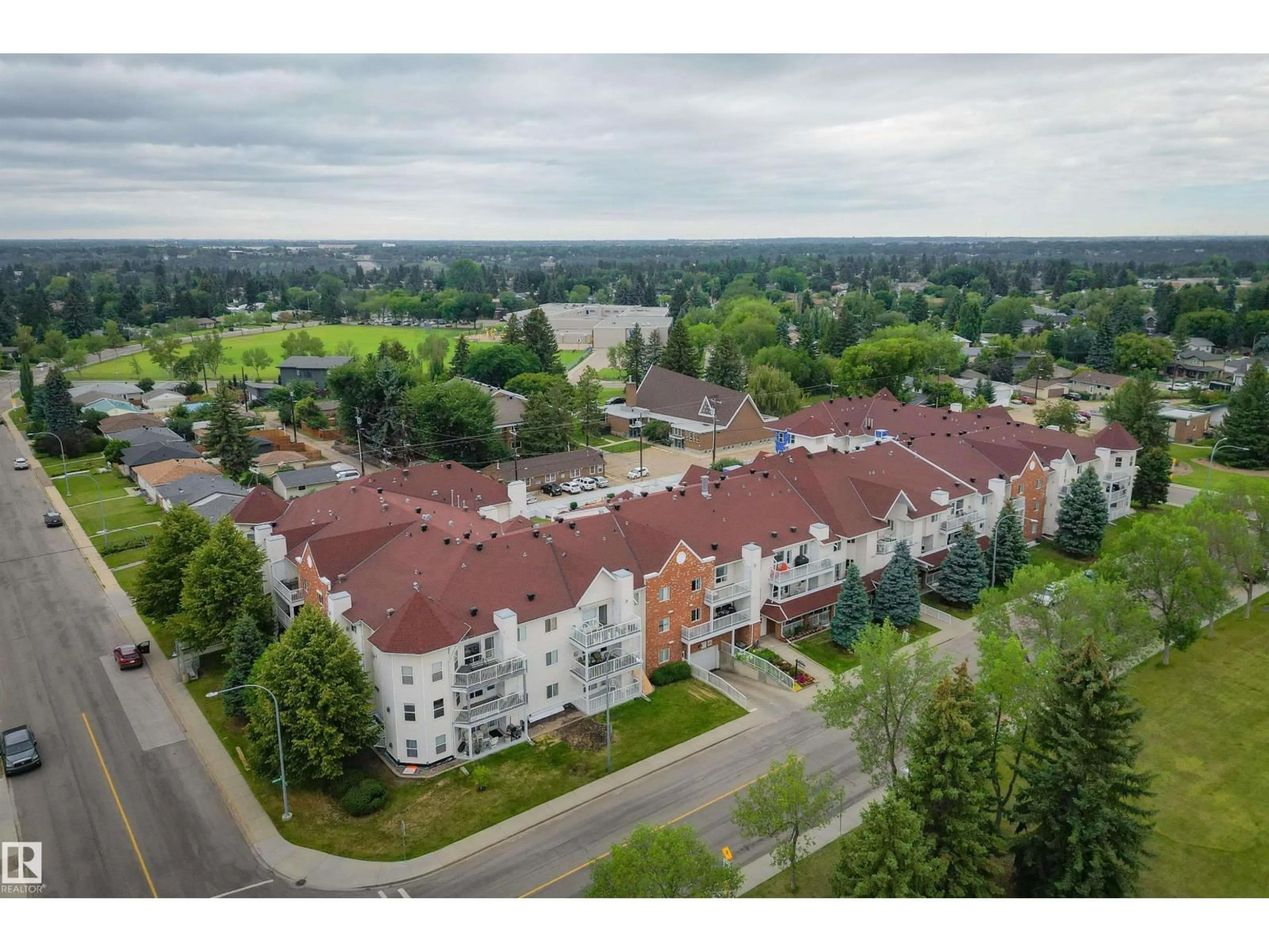 A pic from outside/outdoor area/front of a property/back of a property/a pic from drone, unknown for #304 - 6220 FULTON RD, Edmonton Alberta T6A3T4