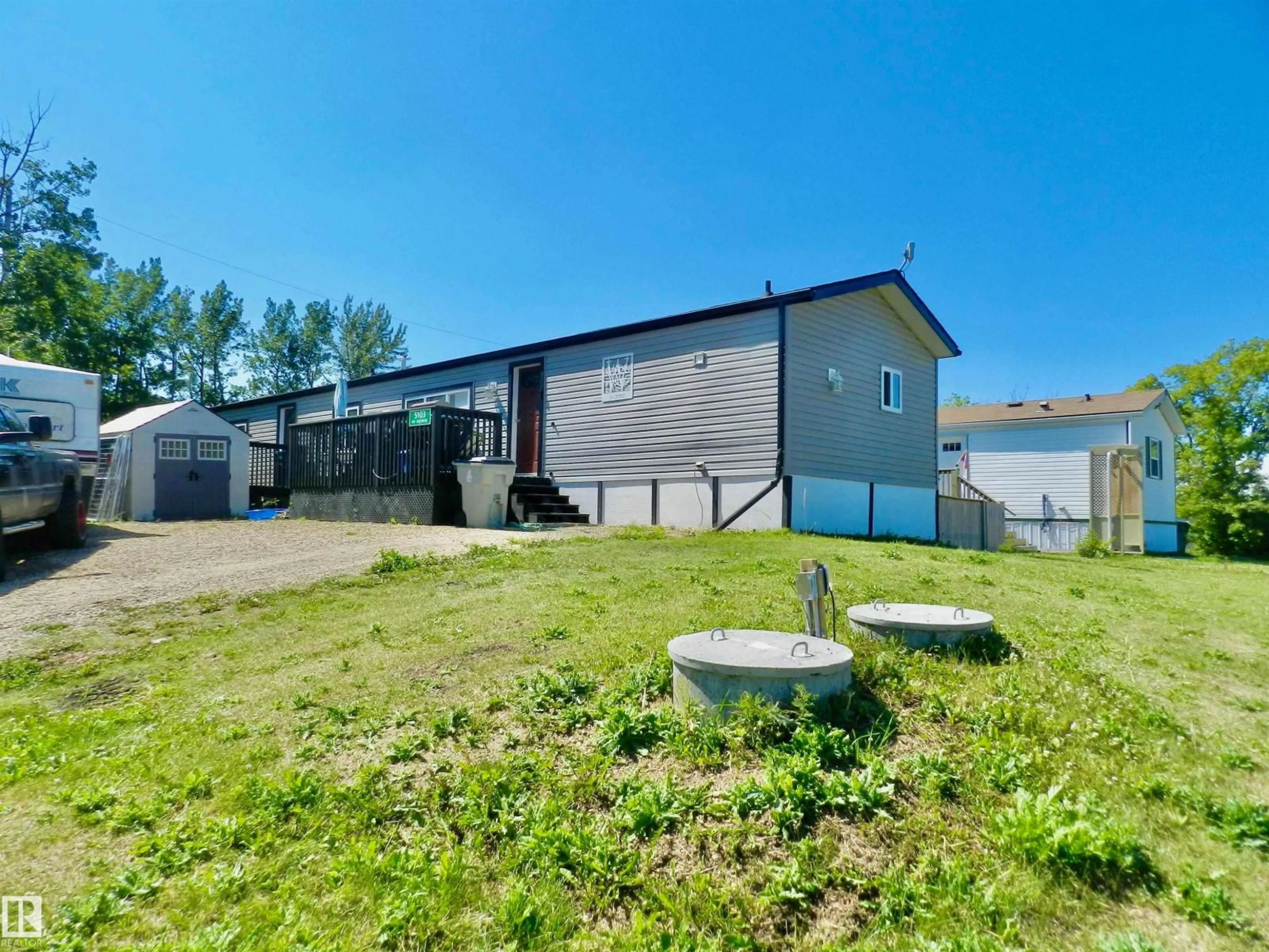 A pic from outside/outdoor area/front of a property/back of a property/a pic from drone, building for 5103 49 AV, Busby Alberta T0G0H0