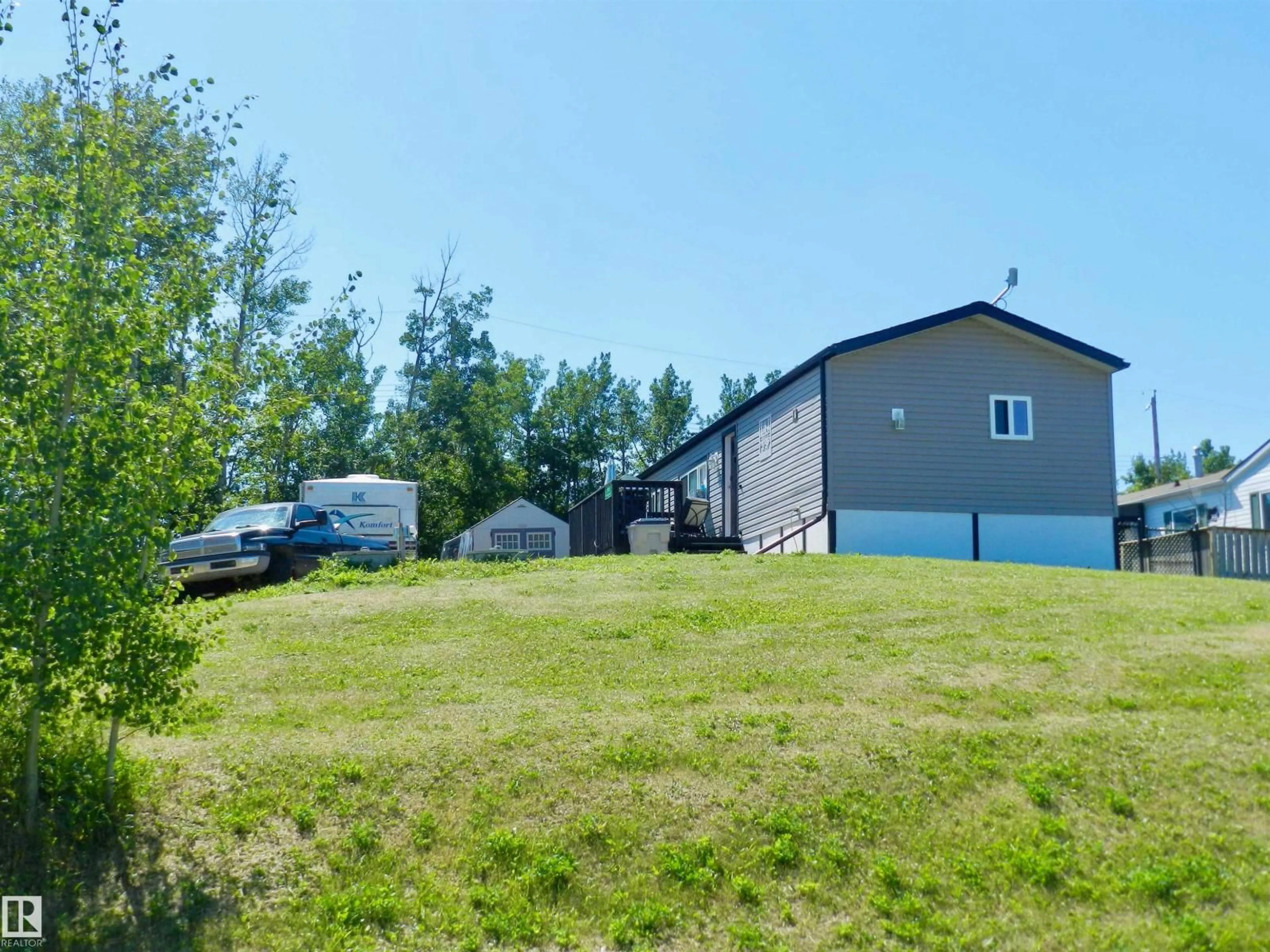 A pic from outside/outdoor area/front of a property/back of a property/a pic from drone, unknown for 5103 49 AV, Busby Alberta T0G0H0