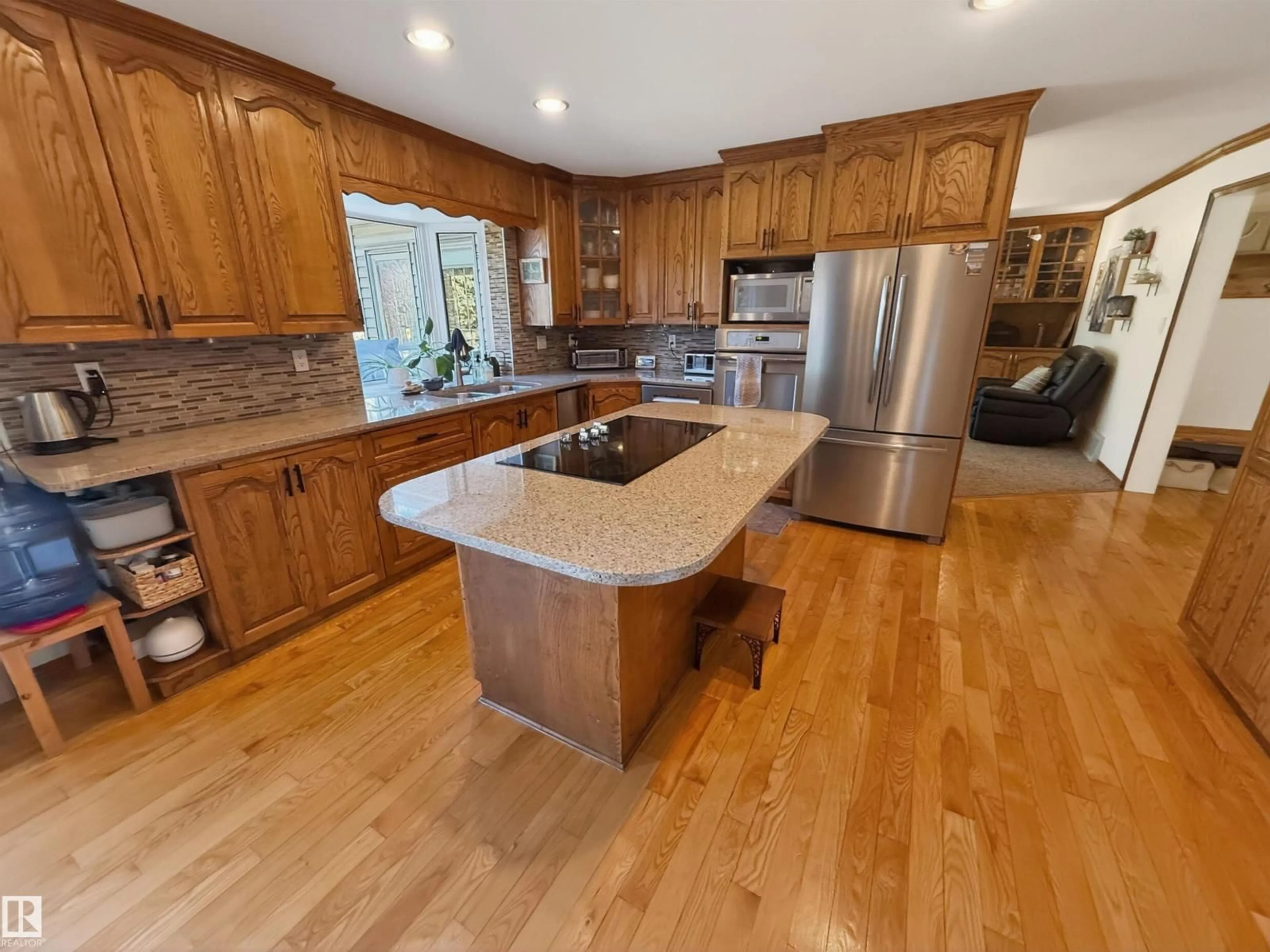 Open concept kitchen, wood/laminate floor for 3 WESTMINSTER CL, Spruce Grove Alberta T7X1S7