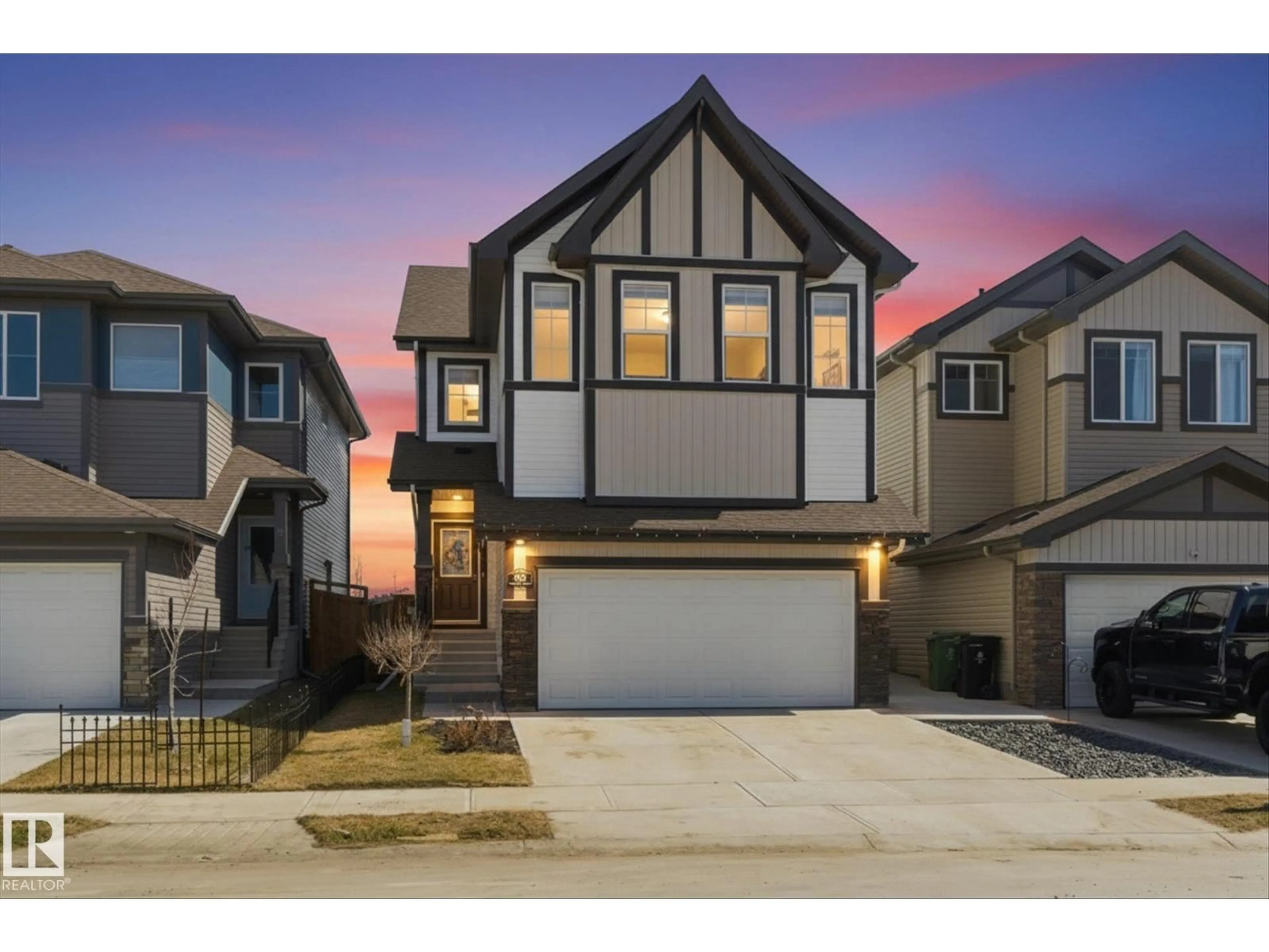 Home with vinyl exterior material, street for 33 SUMAC CL, Fort Saskatchewan Alberta T8L0H6