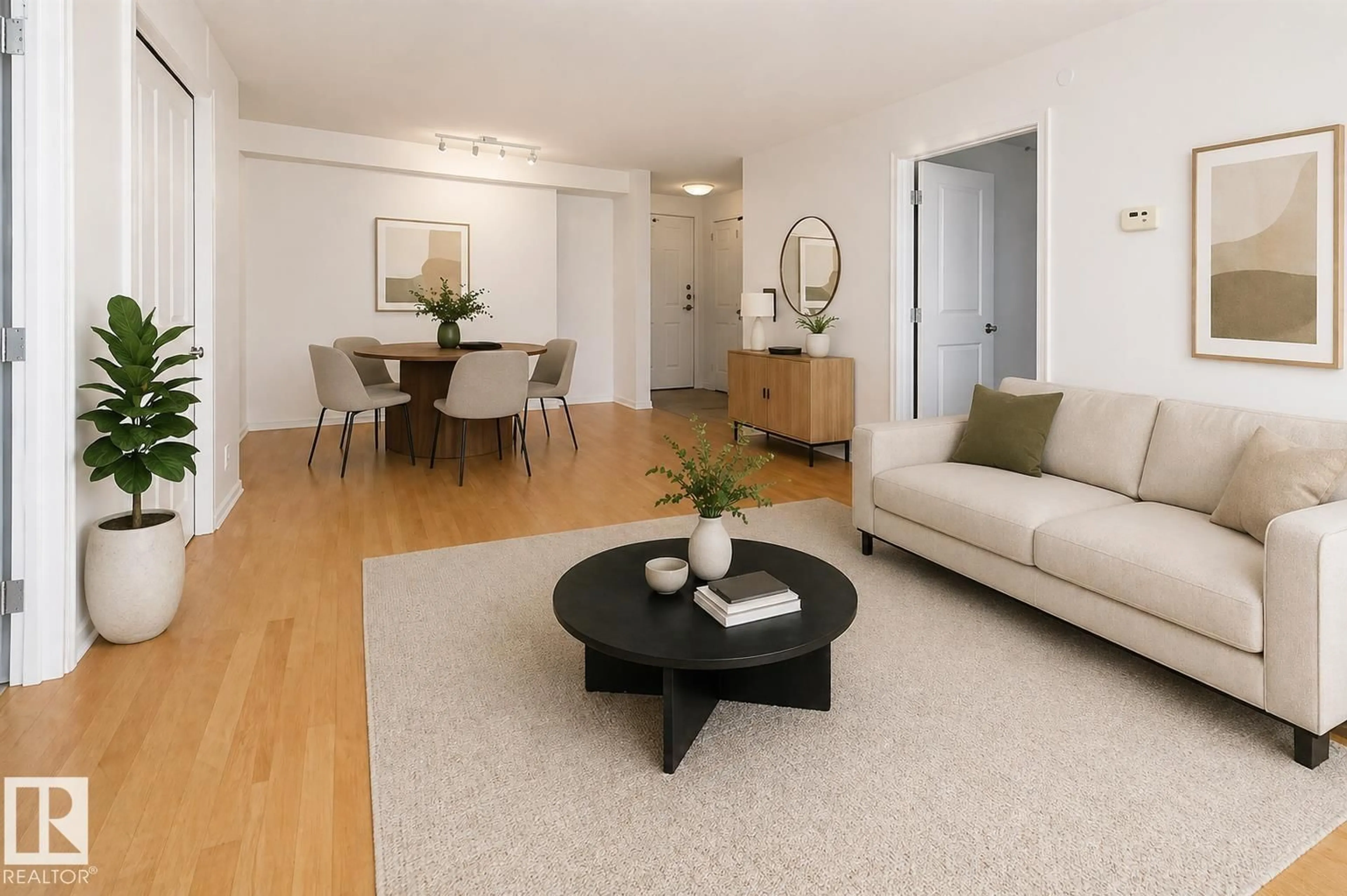 Living room with furniture, wood/laminate floor for 1508 105 ST NW, Edmonton Alberta T5J5G3