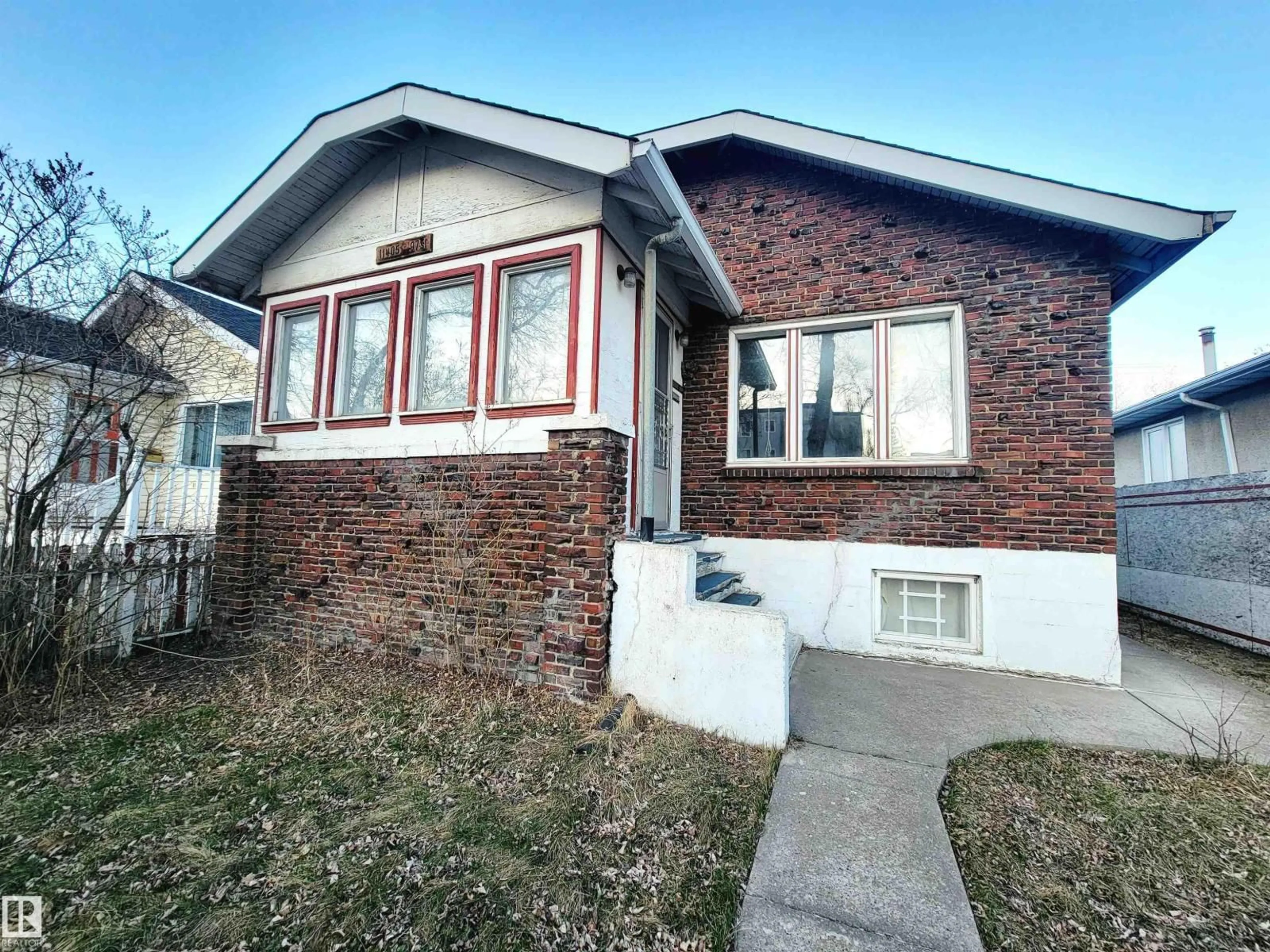 Home with brick exterior material, street for NW - 11405 97 ST, Edmonton Alberta T5G1X6