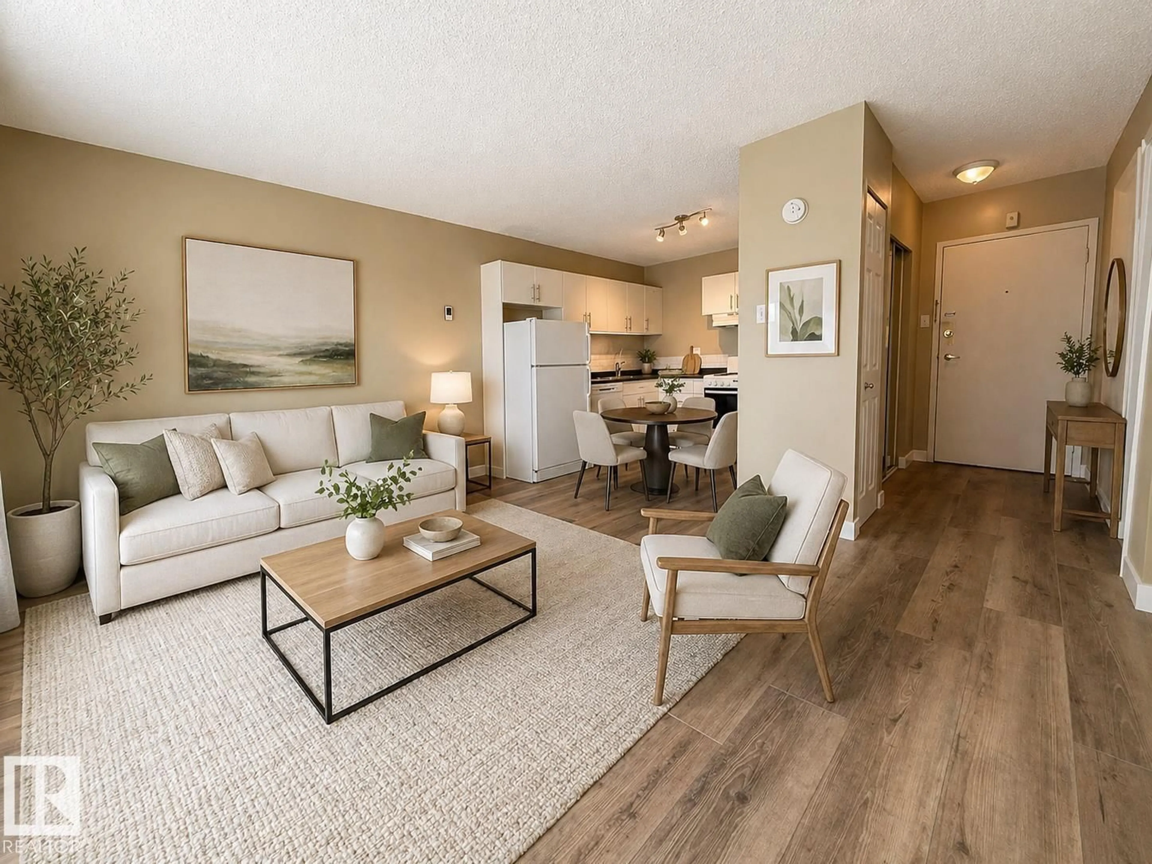 Living room with furniture, wood/laminate floor for 10150 - 505 117 ST, Edmonton Alberta T5K2J2