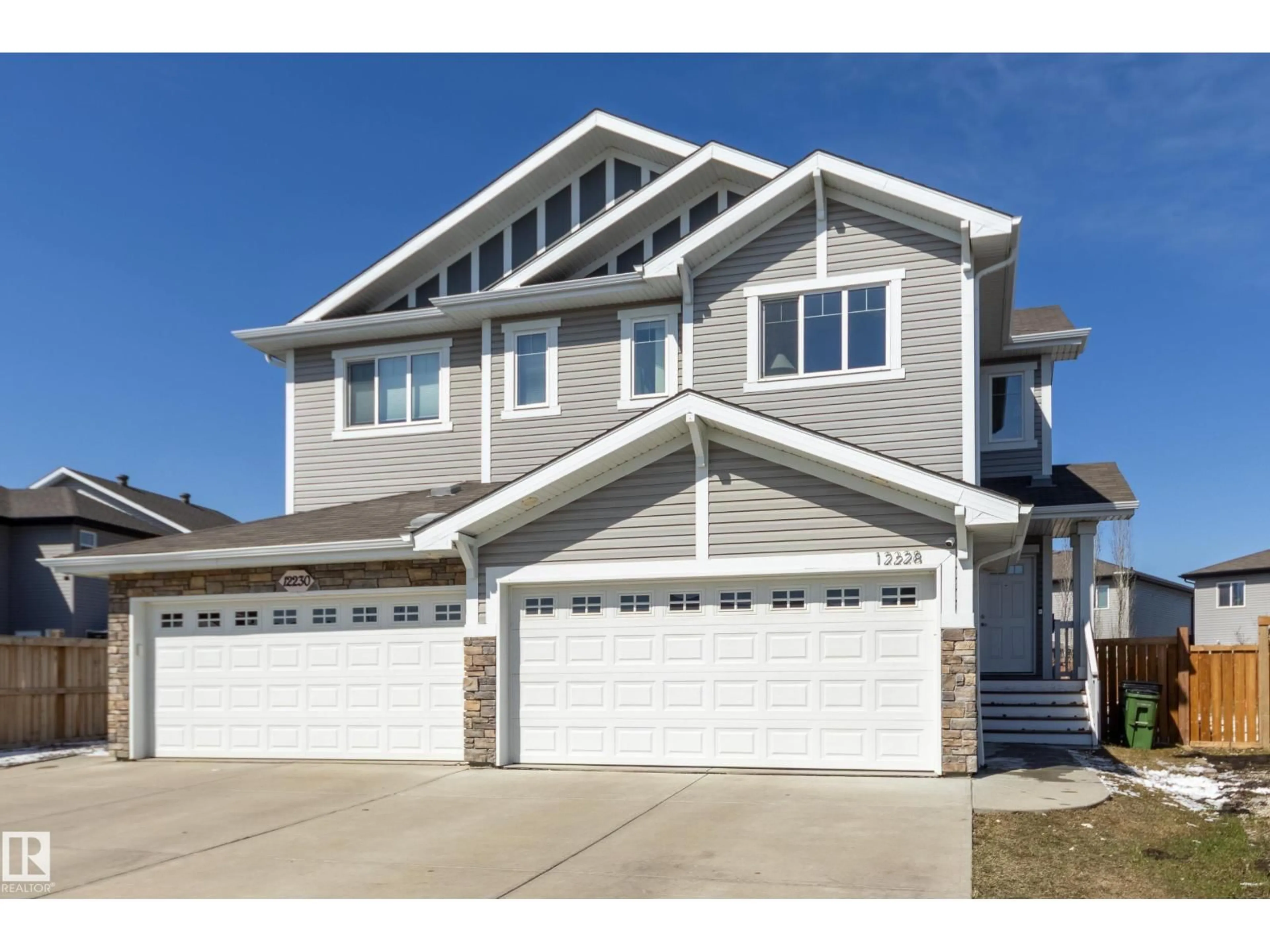 Home with vinyl exterior material, street for NW - 12228 176 AV, Edmonton Alberta T5X0L2