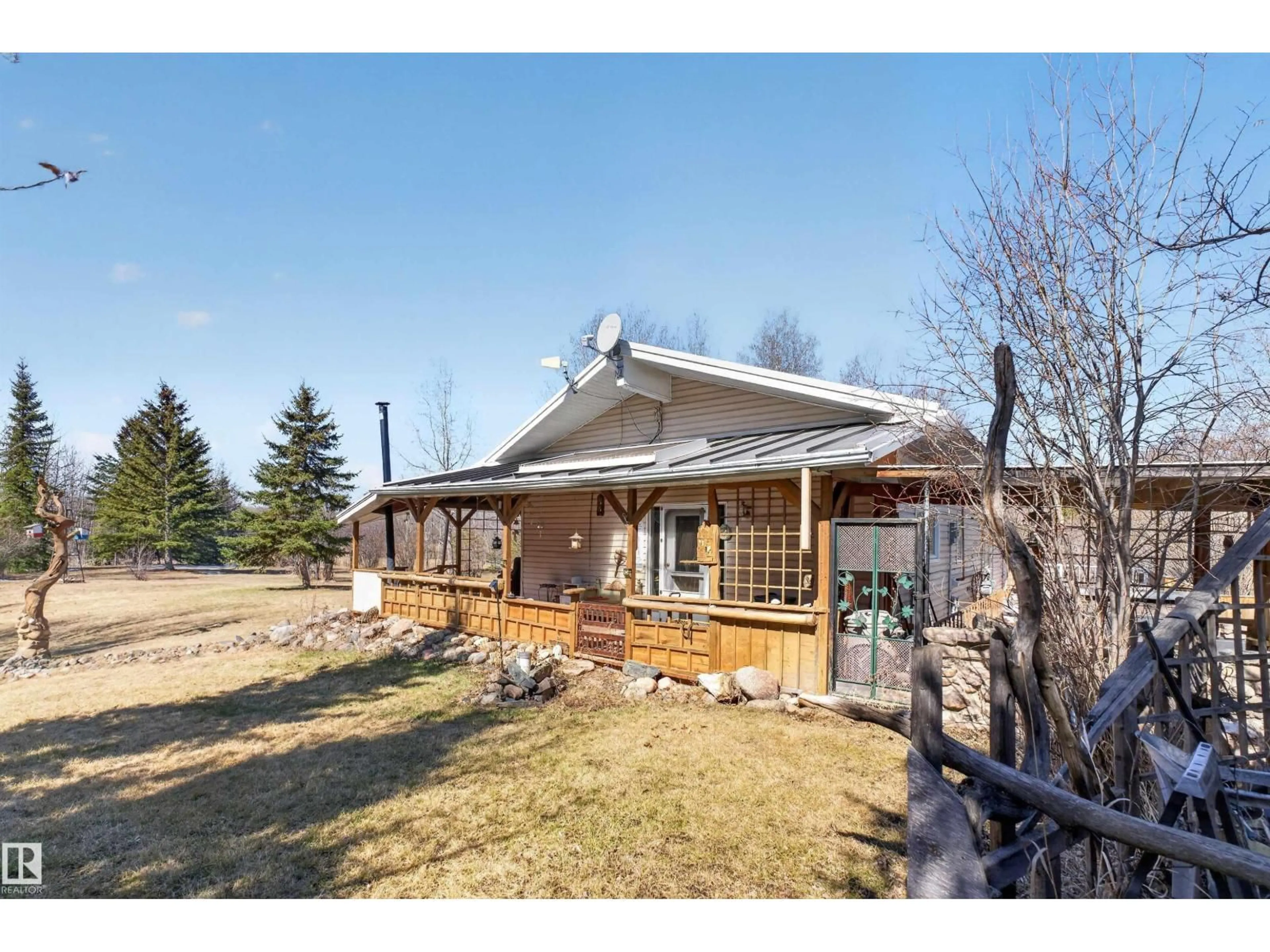 A pic from outside/outdoor area/front of a property/back of a property/a pic from drone, unknown for #45 - 54222 RGE ROAD 25, Rural Lac Ste. Anne County Alberta T0E1V0