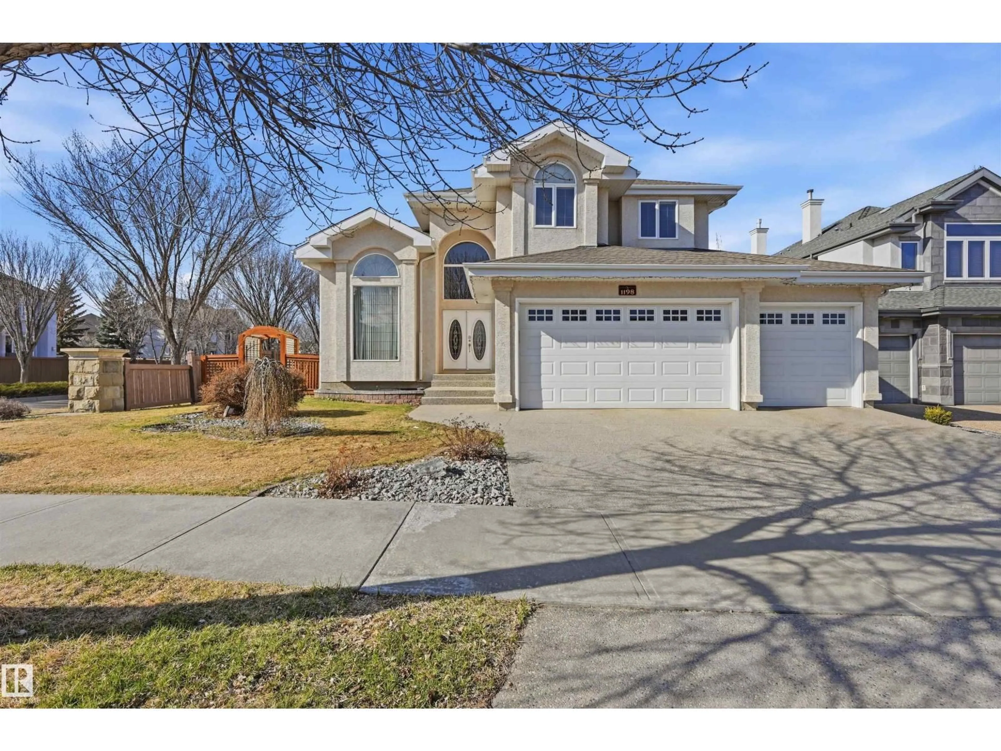 Home with vinyl exterior material, street for 1198 HOLLANDS WY, Edmonton Alberta T6R3S9