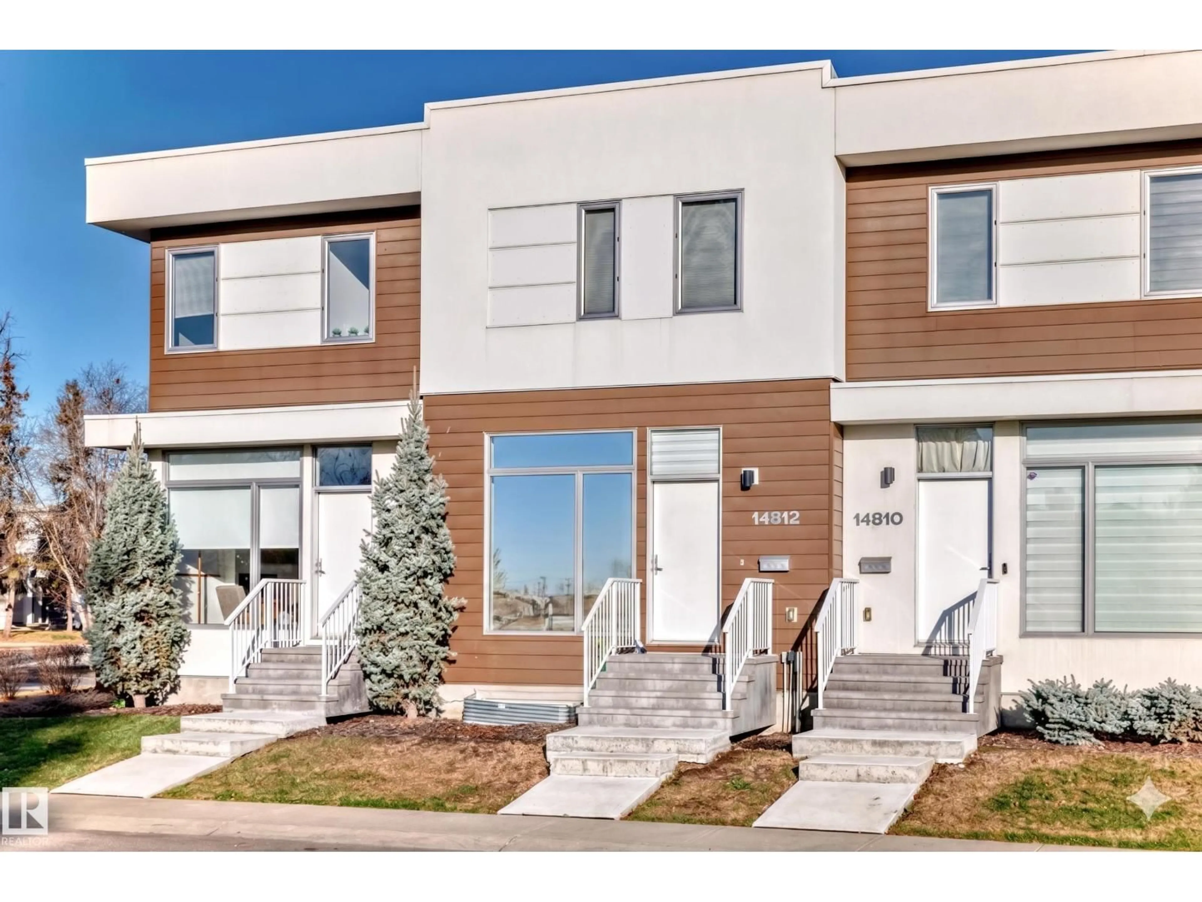 Home with vinyl exterior material, street for 14812 98 AV, Edmonton Alberta T5N0H1
