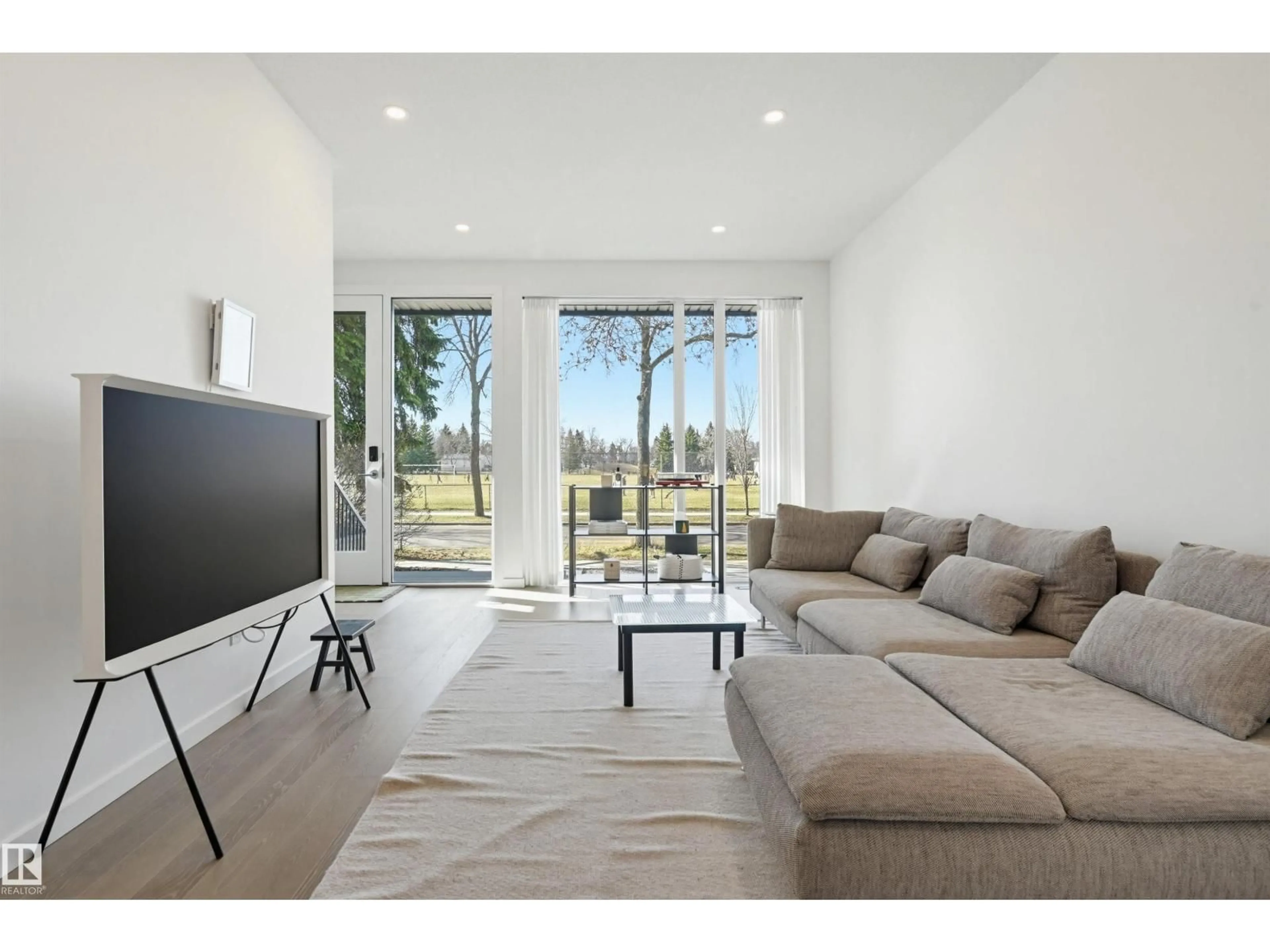 Living room with furniture, unknown for 8518 79 AV, Edmonton Alberta T6C0R4