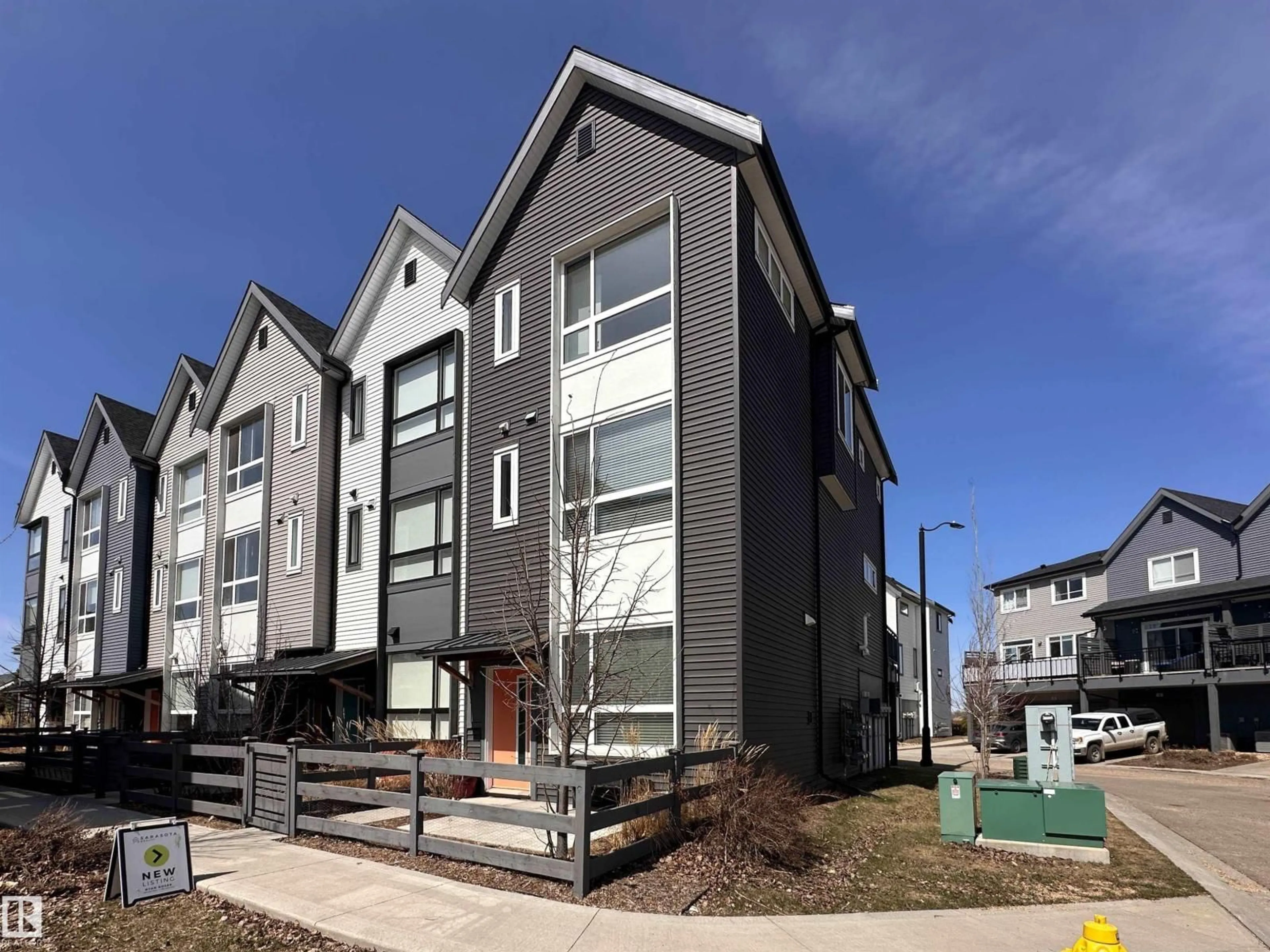 Home with vinyl exterior material, street for 21 - 100 JENSEN LAKES BV, St. Albert Alberta T8N7T9