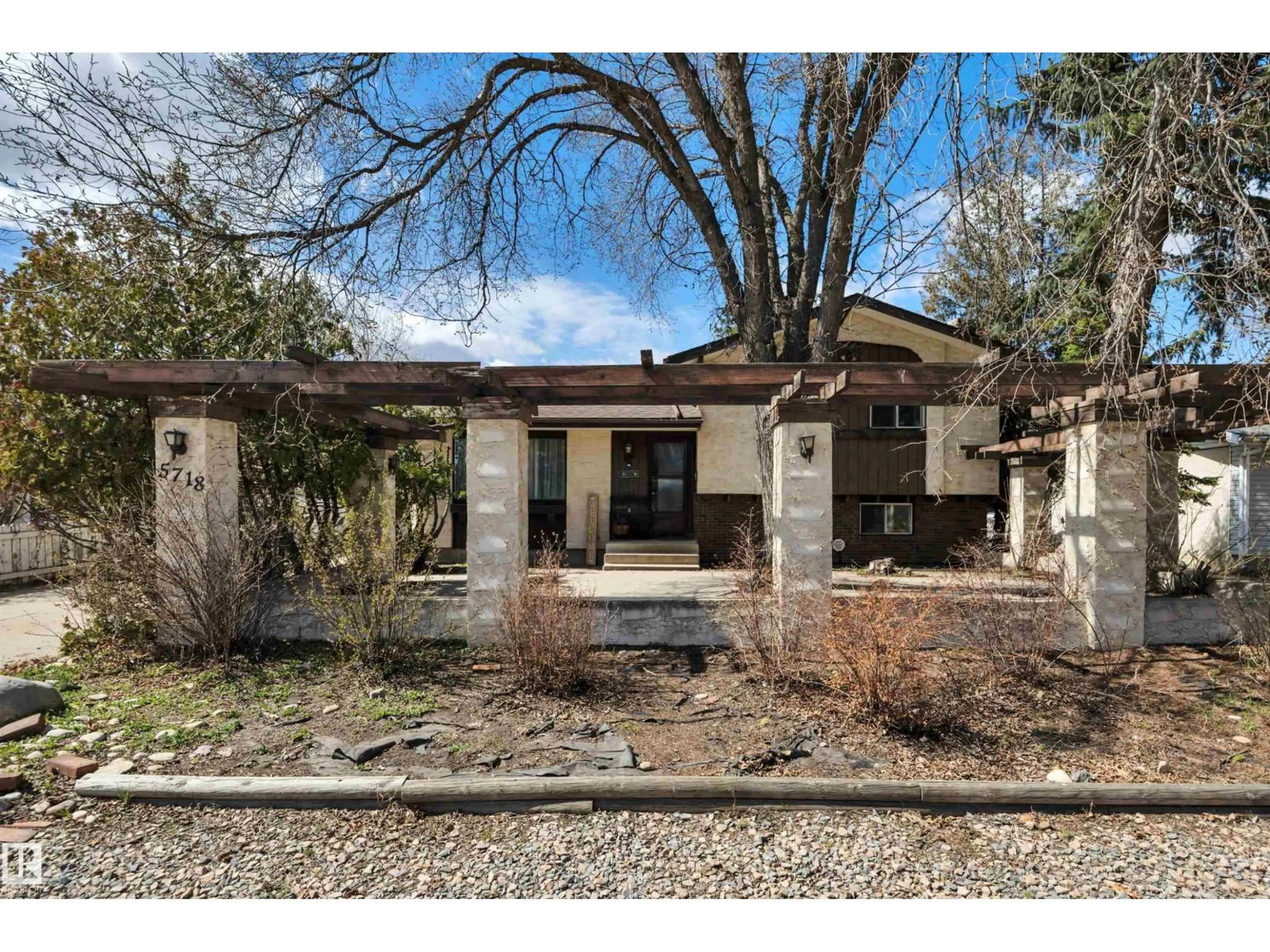 Home with brick exterior material, street for 5718 GARDEN MEADOWS DRIVE, Wetaskiwin Alberta T9A2L6