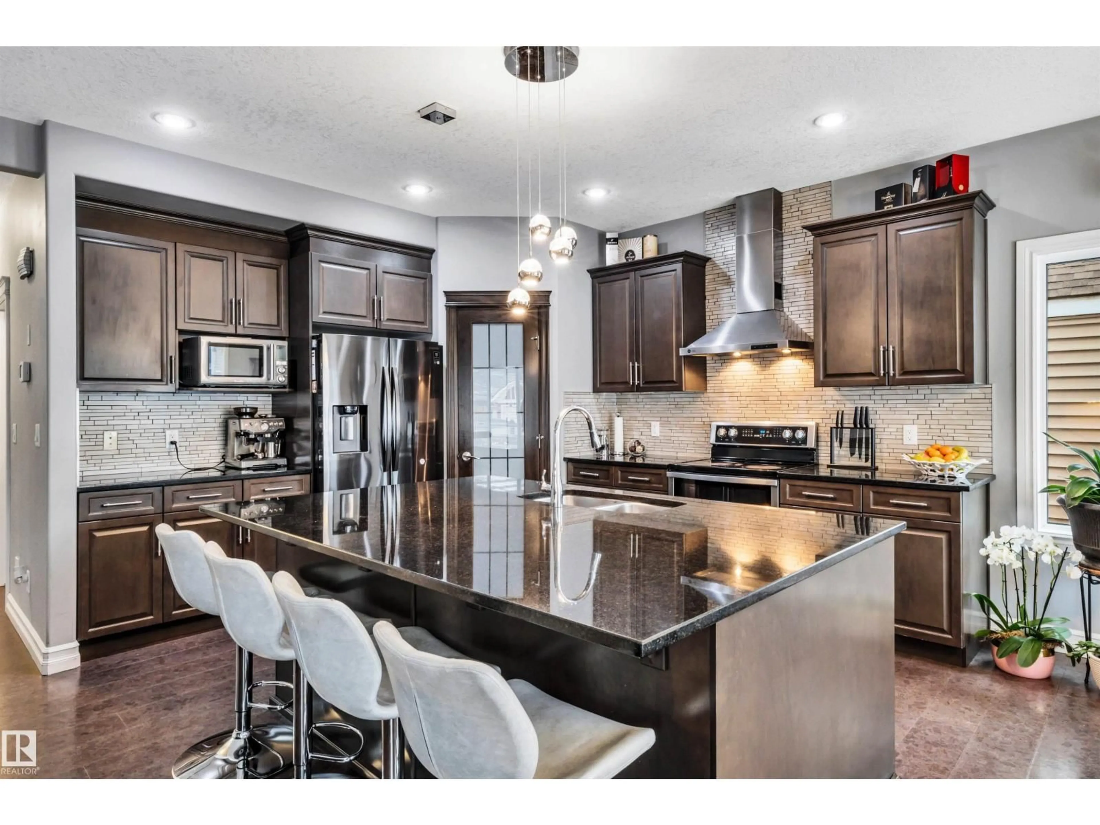 Open concept kitchen, unknown for 7728 18 AV, Edmonton Alberta T6X0V3