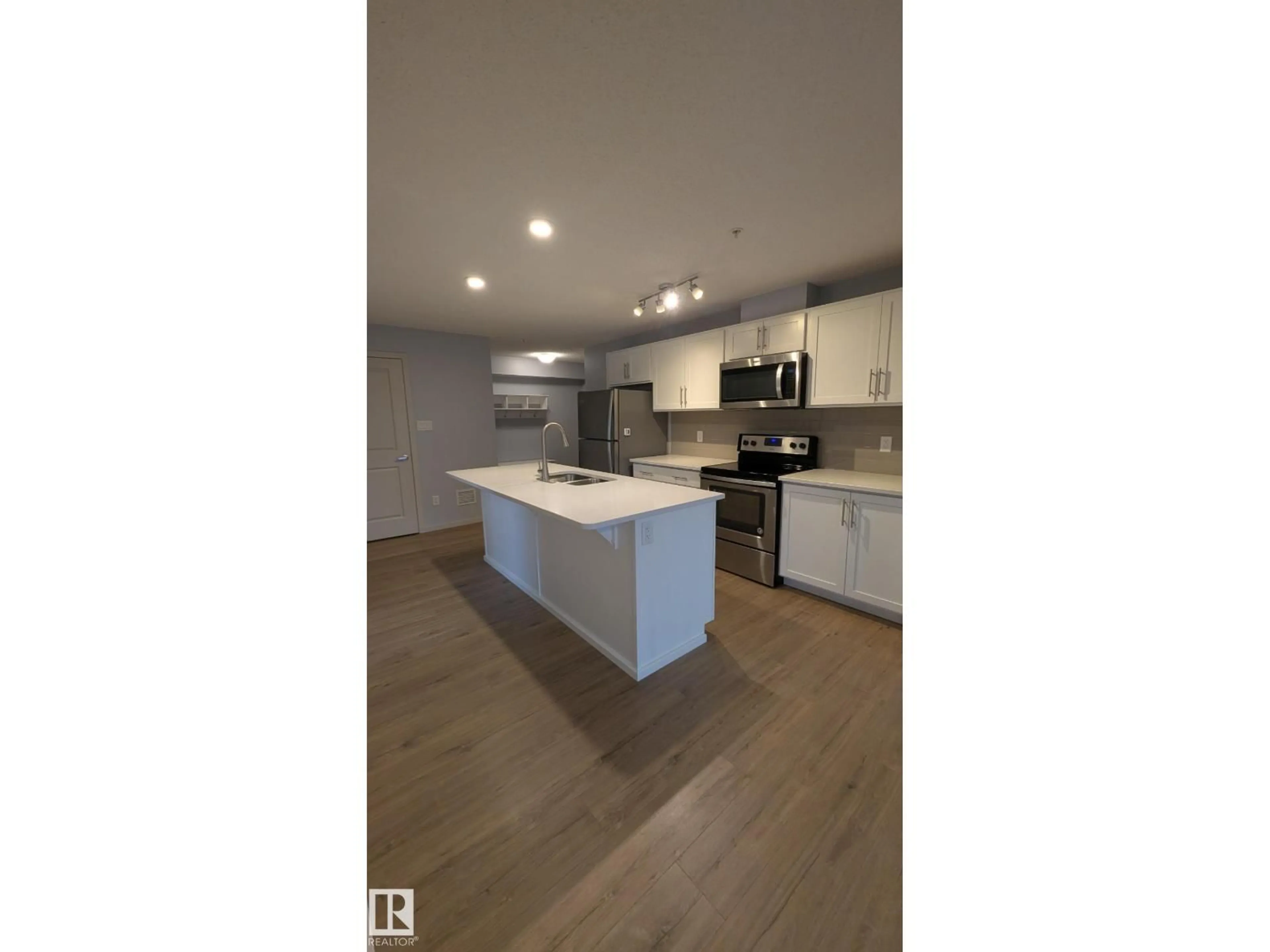 Open concept kitchen, unknown for 120 - 5404 7 AV, Edmonton Alberta T6X2X4