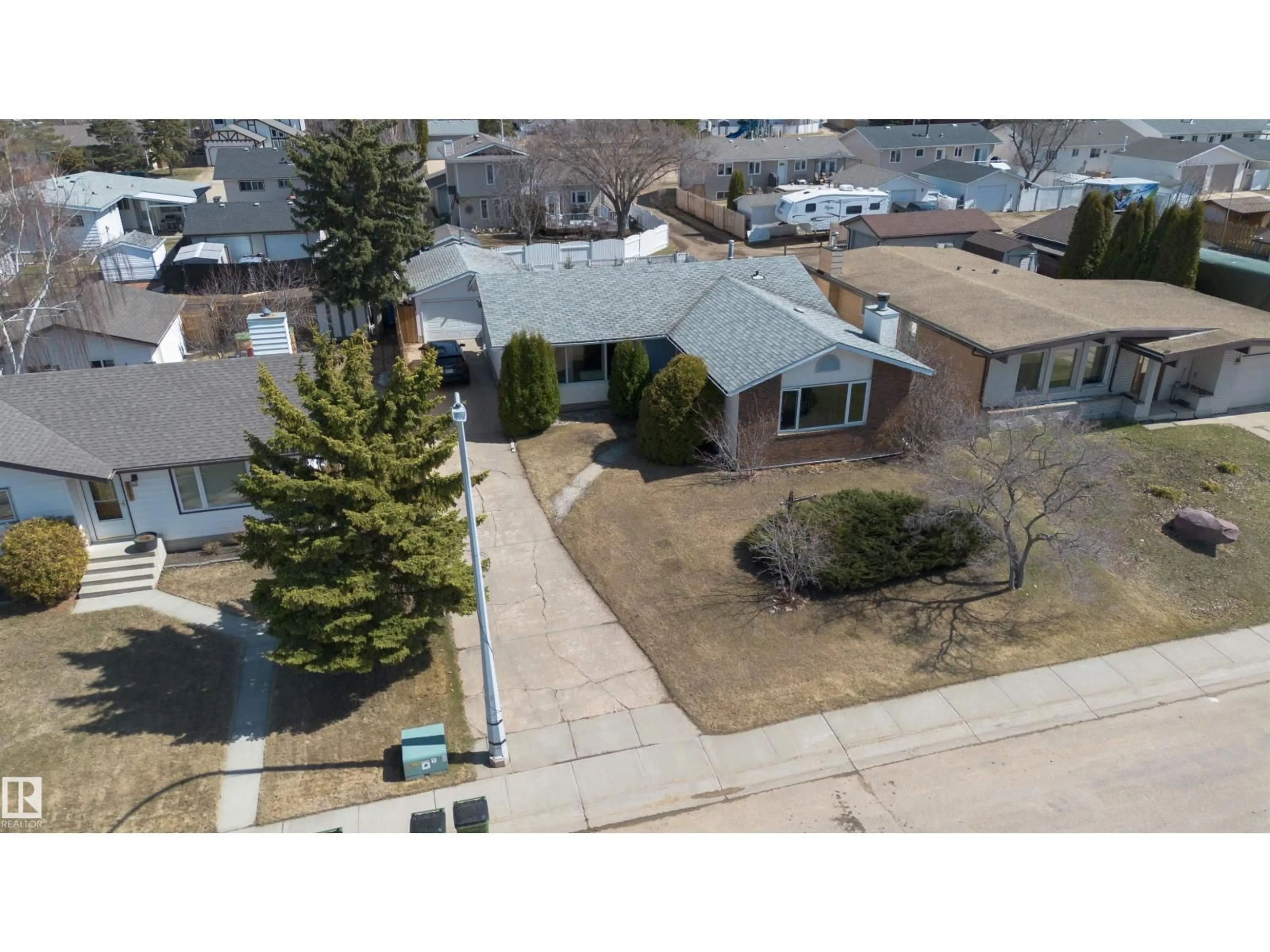 A pic from outside/outdoor area/front of a property/back of a property/a pic from drone, street for 10723 108 AV, Westlock Alberta T7P1C7