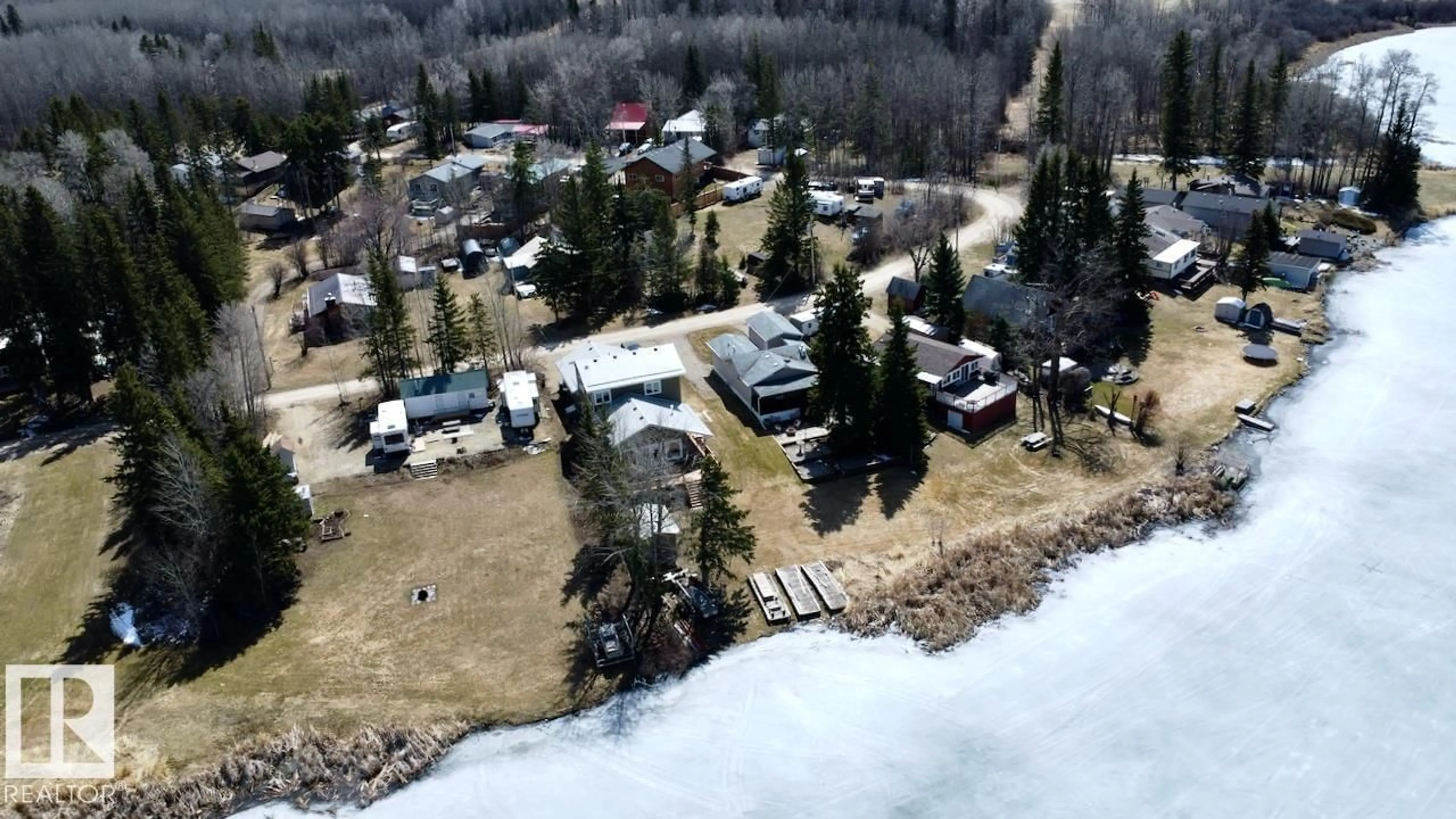 A pic from outside/outdoor area/front of a property/back of a property/a pic from drone, water/lake/river/ocean view for 54114 - 35 RGE ROAD 52, Rural Lac Ste. Anne County Alberta T0E0L0