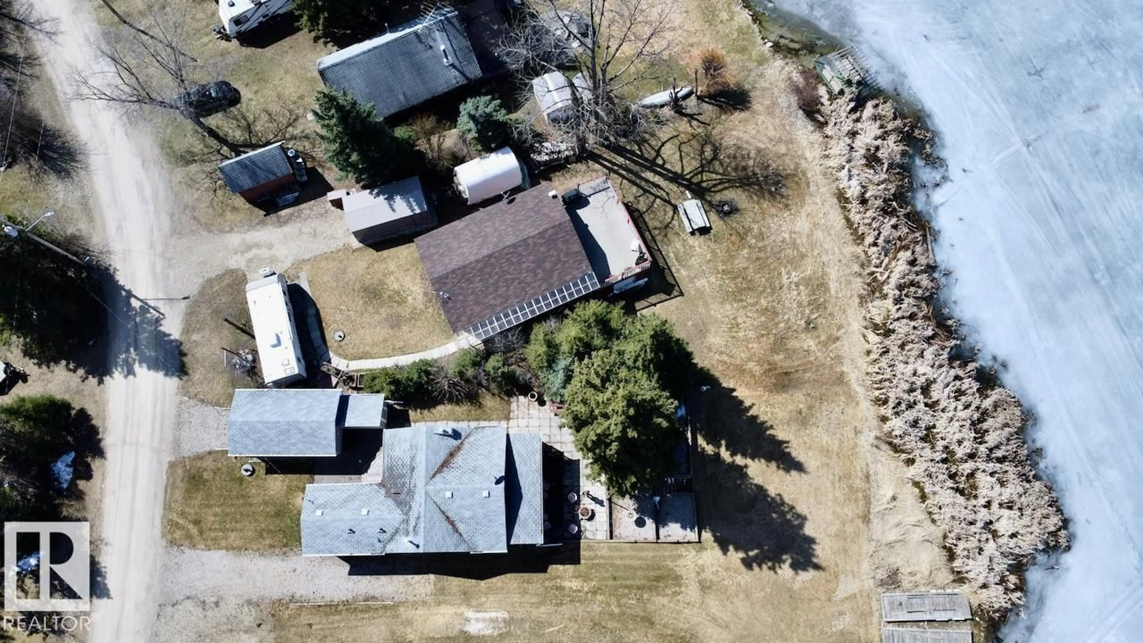 A pic from outside/outdoor area/front of a property/back of a property/a pic from drone, street for 54114 - 35 RGE ROAD 52, Rural Lac Ste. Anne County Alberta T0E0L0